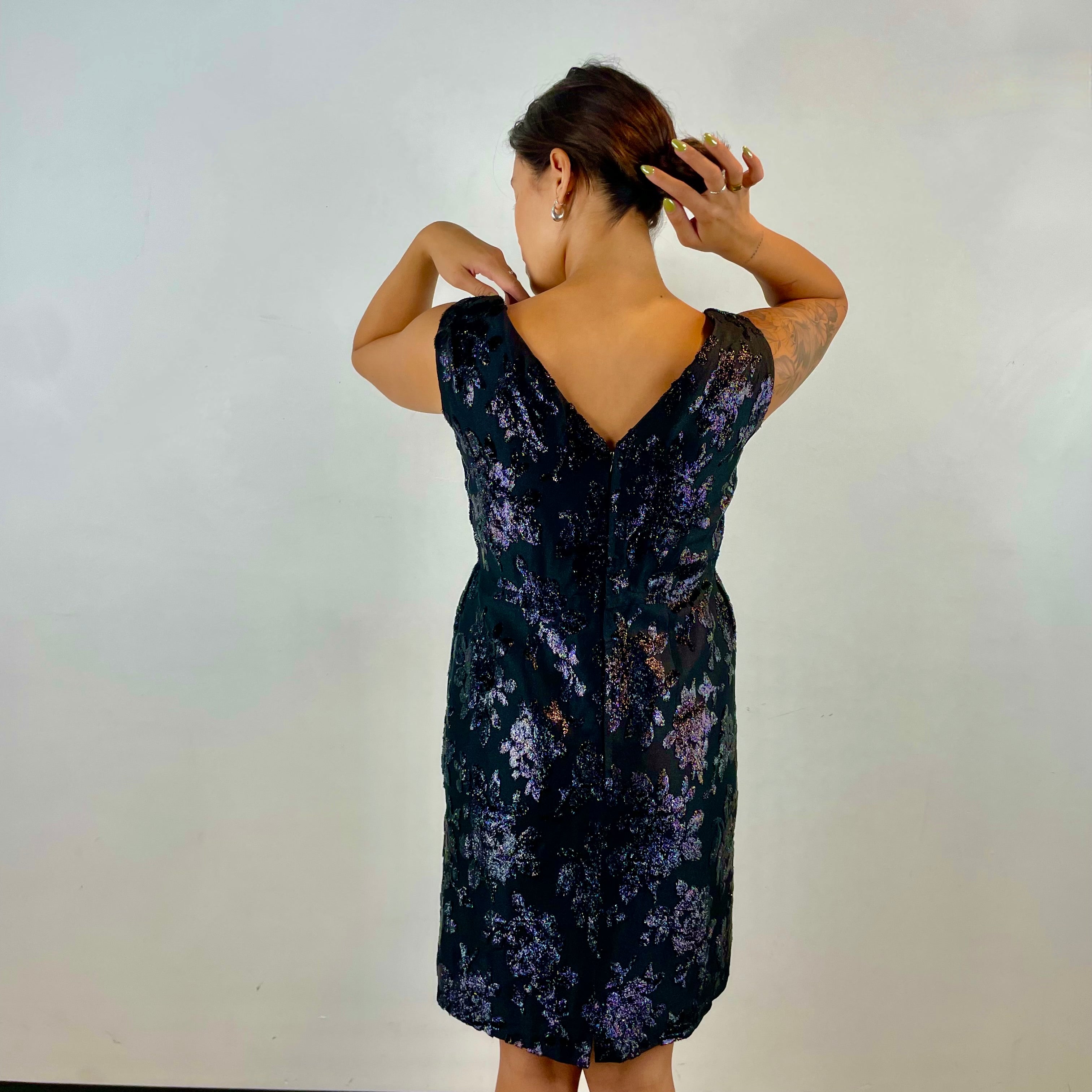 Back view of 1950s-1960s Floral Brocade Black Iridescent Cocktail Dress Size Medium sold at bohemevintage.com Montreal