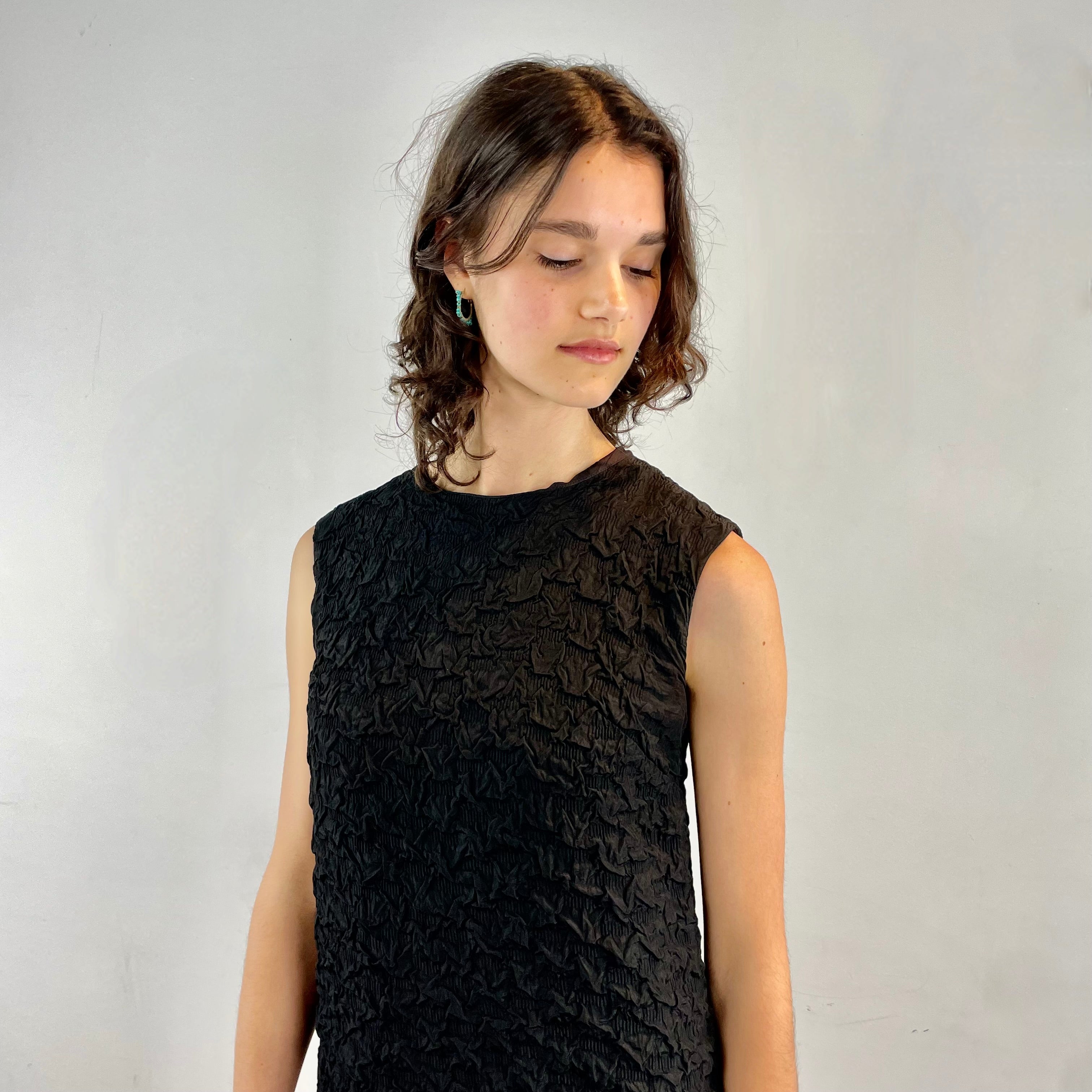 Close up view of top of 1960s Sleeveless Black Shift Dress with Fur Trim Size Small sold at bohemevintage.com Montreal