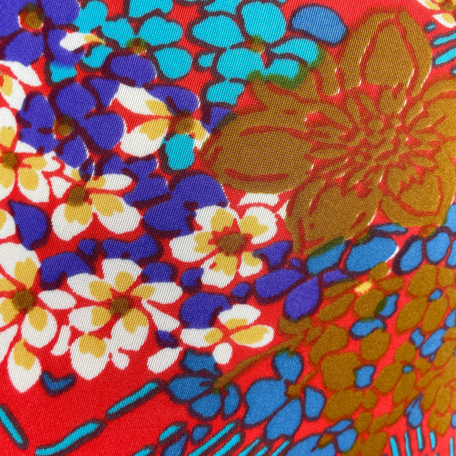 Close-up view of print of fabric of 1960s/70s One-piece Open Back Bathing Suit Size Small sold at bohemevintage.com, Montreal