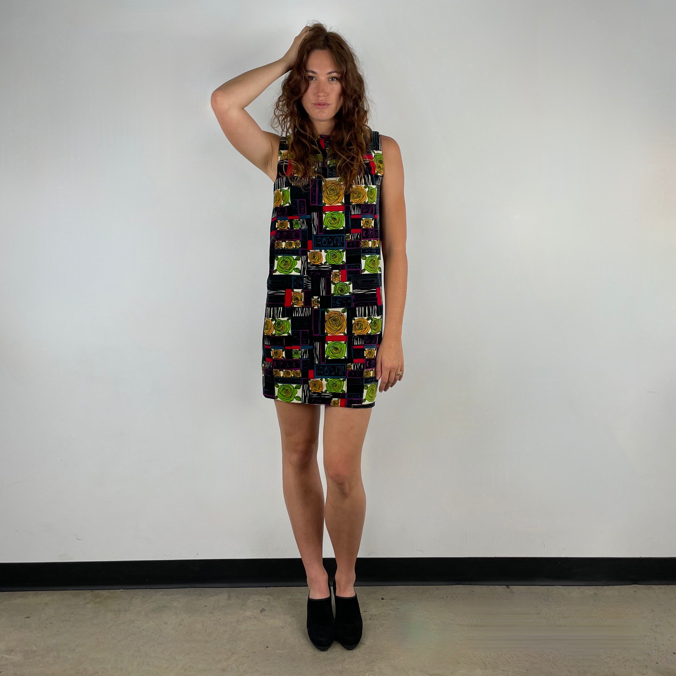 Front view of 1960s Rose Motifs Velvet Shift Dress
Size Small/Medium
Sold at bohemevintage.com Montréal