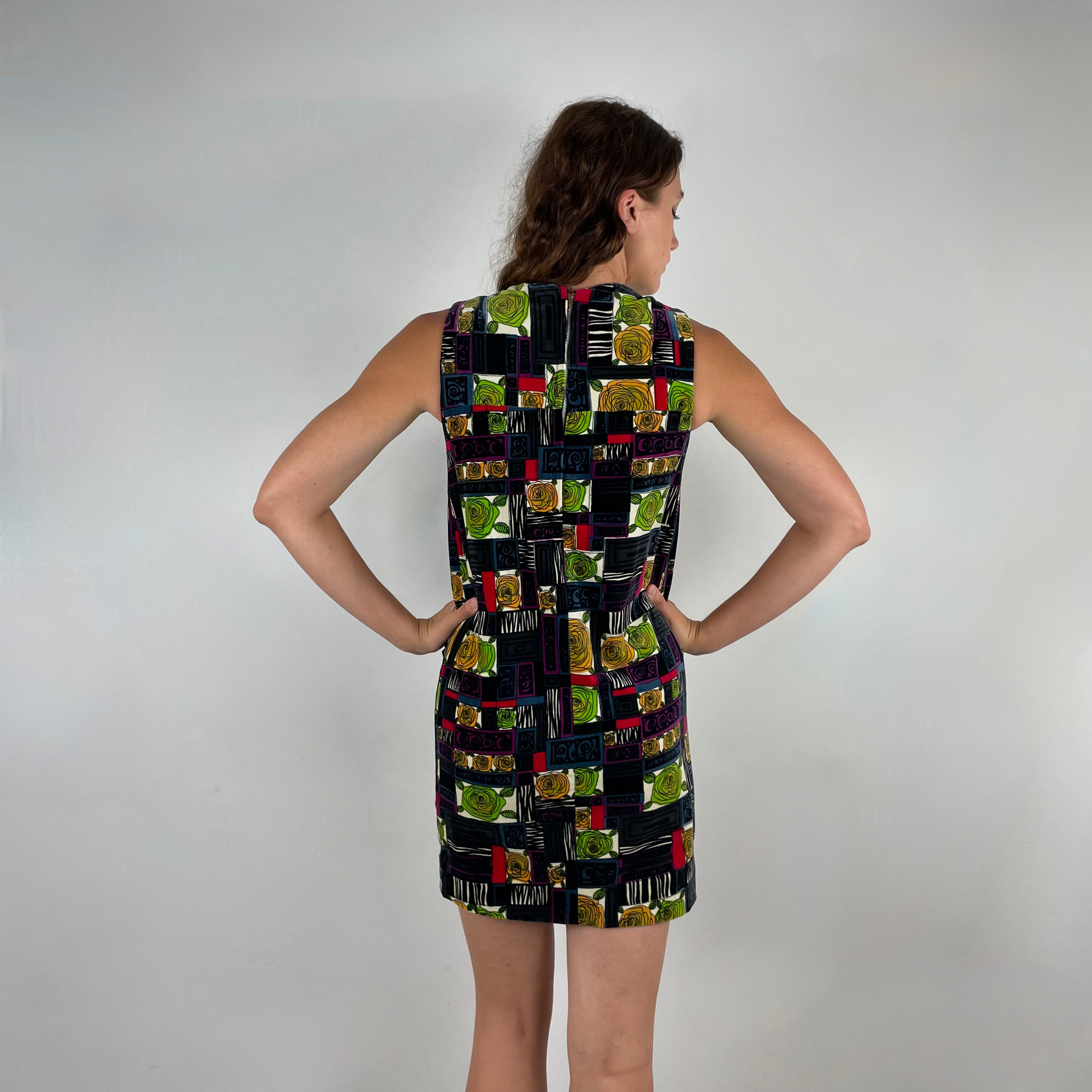 Back view of 1960s Rose Motifs Velvet Shift Dress
Size Small/Medium
Sold at bohemevintage.com Montréal