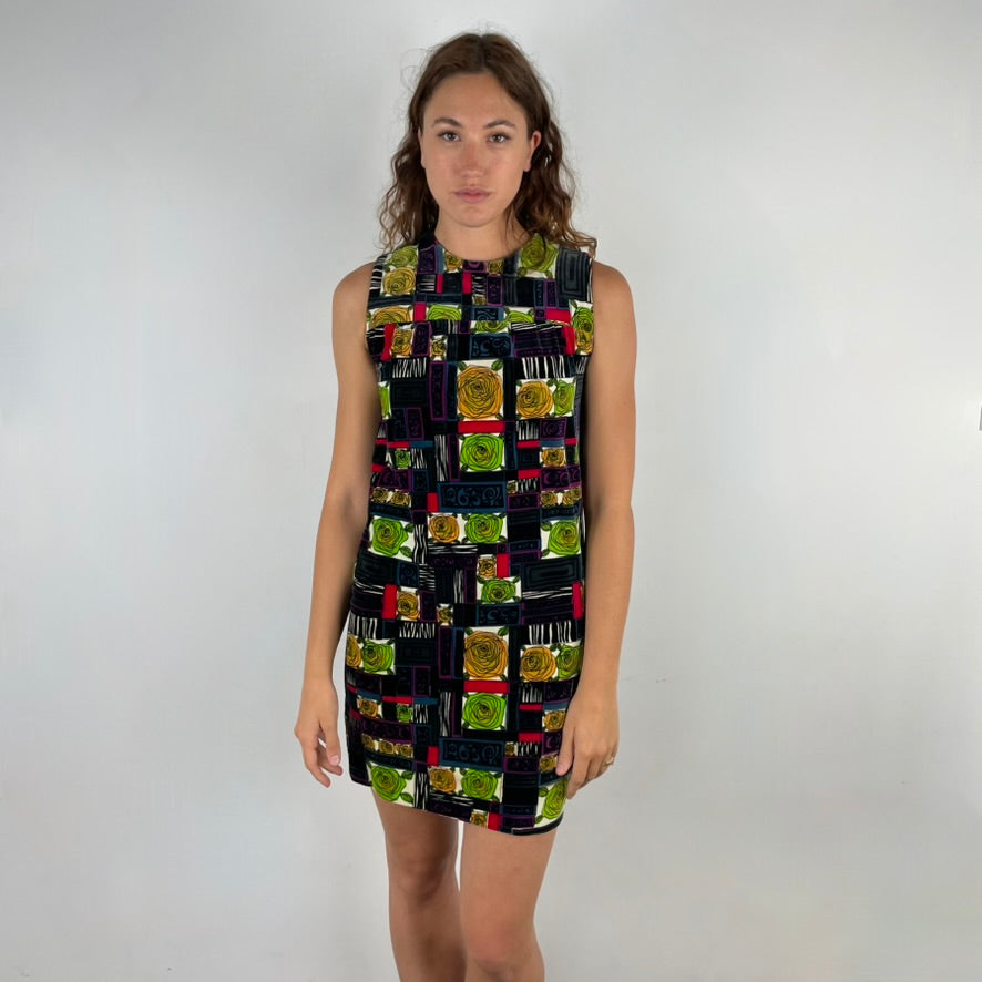 Front view of 1960s Rose Motifs Velvet Shift Dress
Size Small/Medium
Sold at bohemevintage.com Montréal