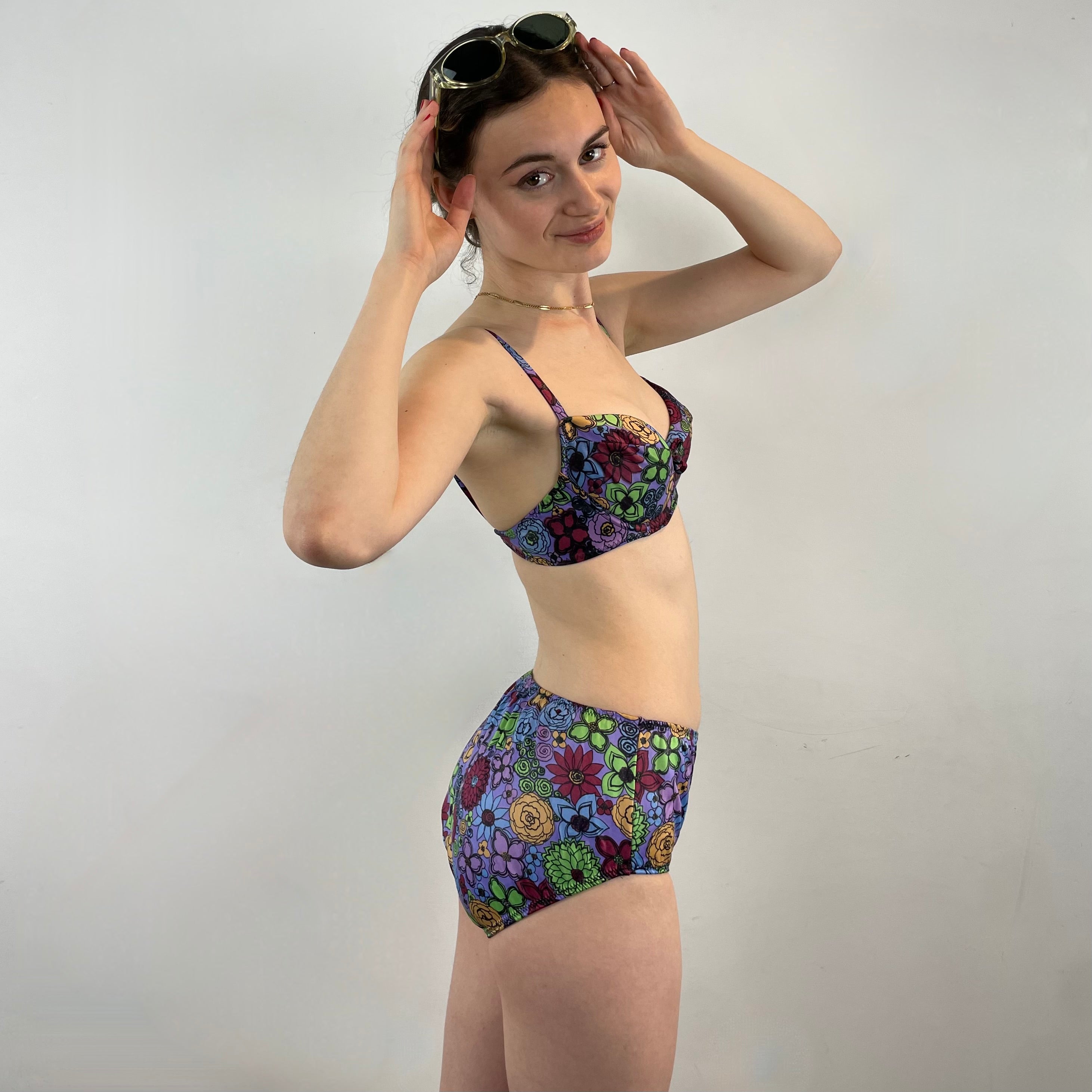 Boheme Vintage 1960s Smart Brassière floral two-piece swimsuit with underwire top, adjustable straps, and mid-rise bottoms.