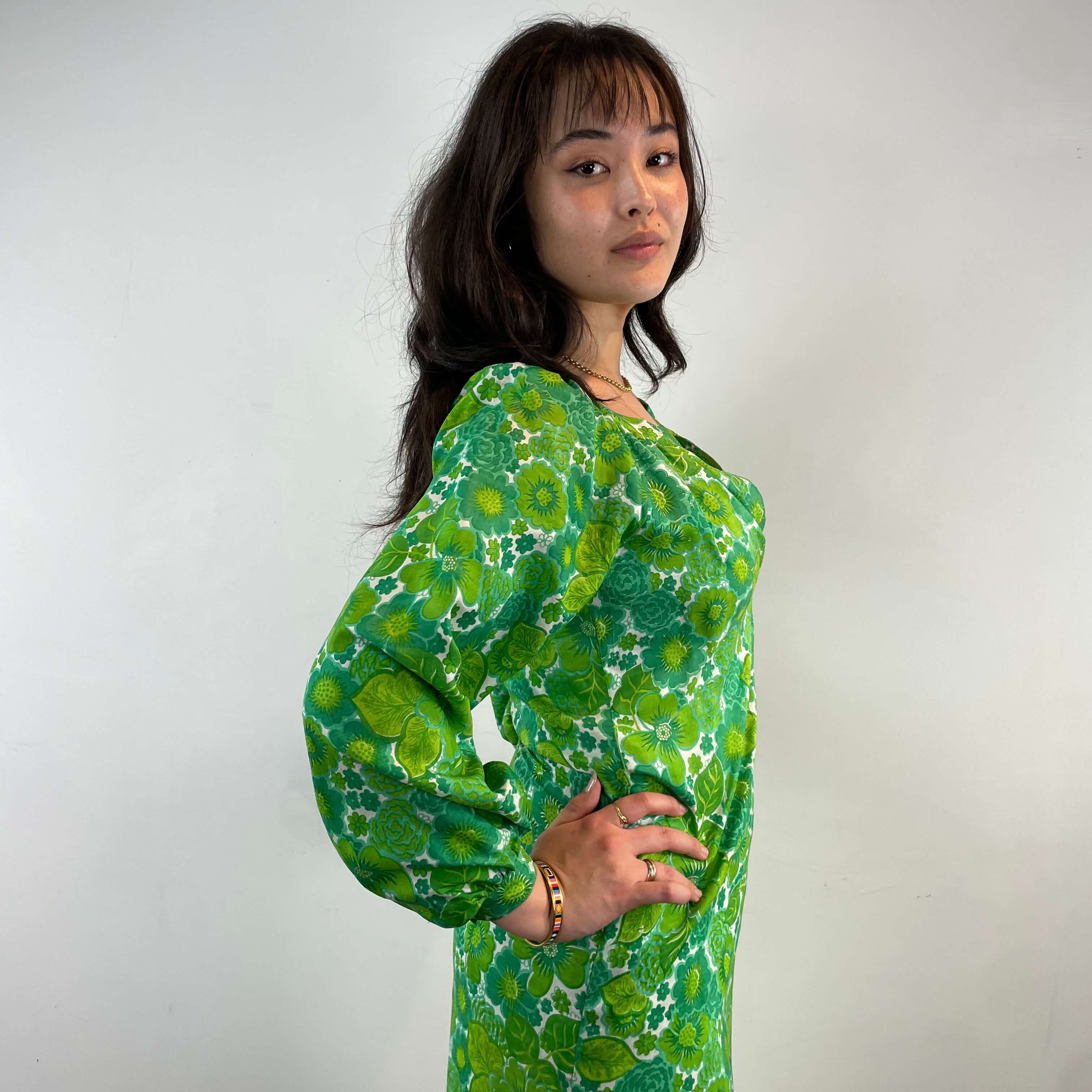 Side view of 1970s Bold Print Long-Sleeved Silk Maxi Dress Size Medium sold at bohemevintage.com Montreal