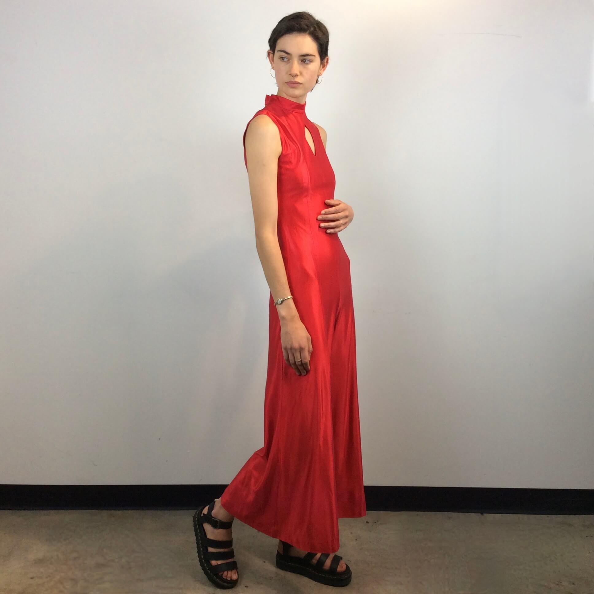 Front and Side view of 1970s Red Wide Leg Jumpsuit size Small sold at bohemevintage.com Montreal