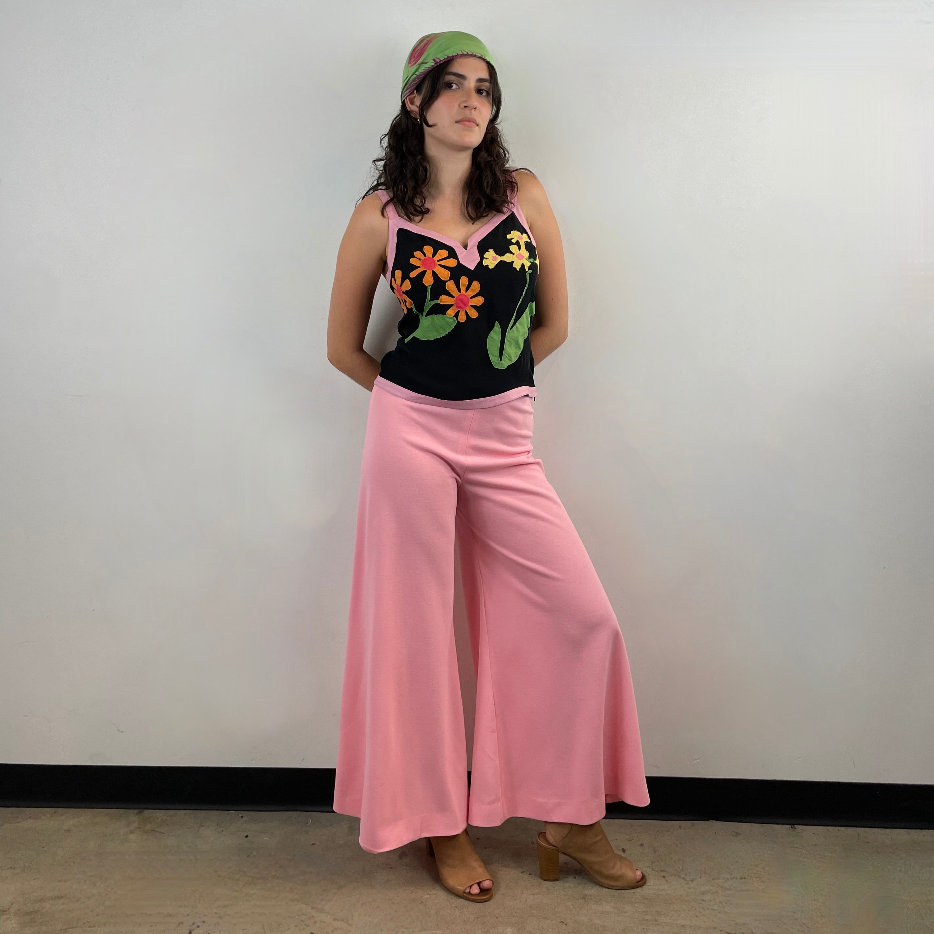 1970s handmade pink high-waisted wide leg jersey pants. Comfortable, flattering, and perfect for festivals, parties, and standout vintage style.