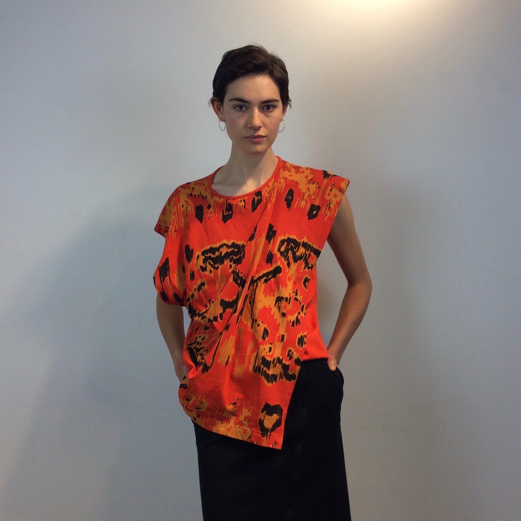 Front view of 1980s Jean-Claude Poitras Asymmetrical short sleeve Top
Size Small/Medium
sold at bohemevintage.com, Montréal