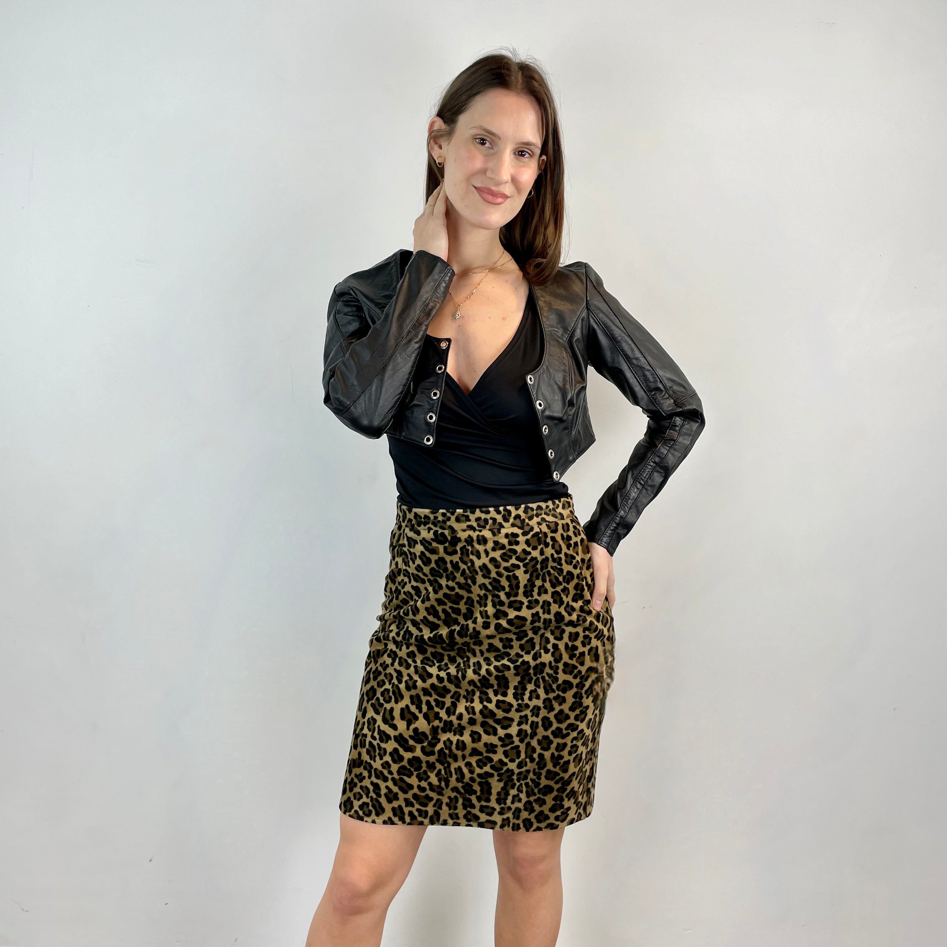 Front view of 1990's Knee-Length Leopard Print Velvet Skirt Size Small/ Medium sold at bohemevintage.com Montreal
