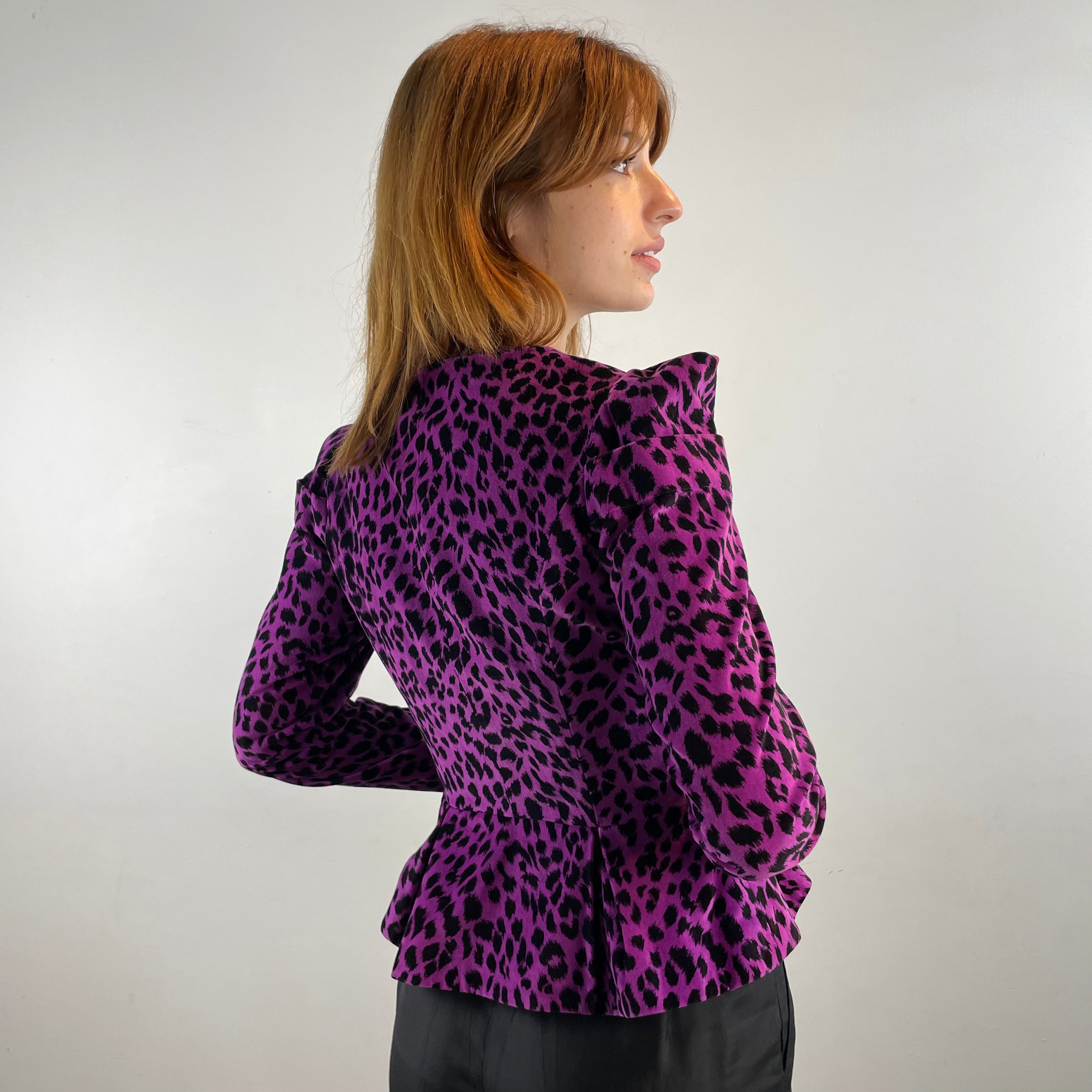 Boheme Vintage 1990s Betsey Johnson velvet leopard print peplum blazer with asymmetrical zipper and structured silhouette.