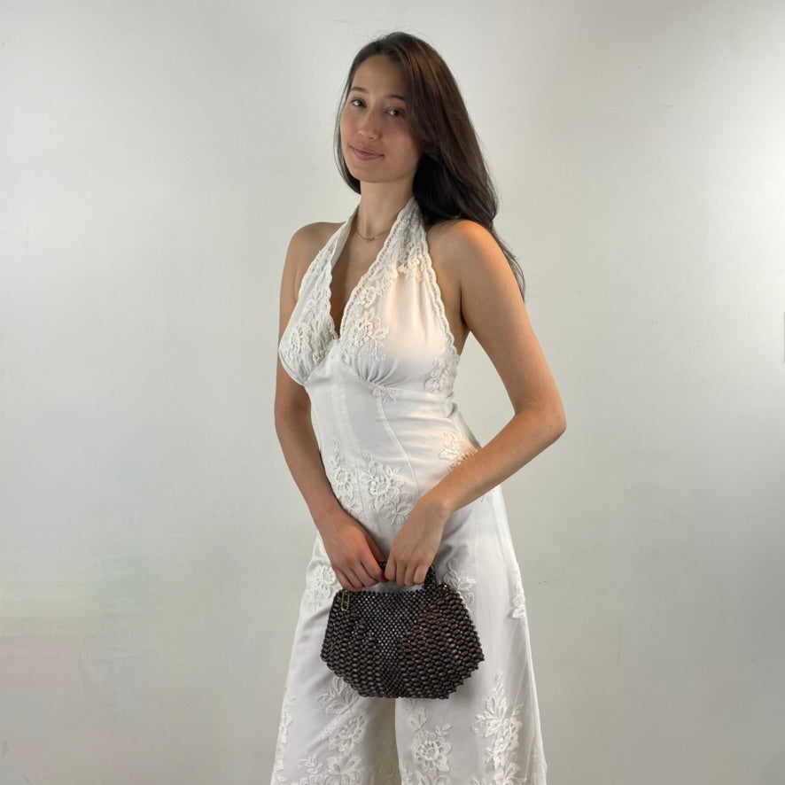 1970s White Embroidered Wide-Leg Jumpsuit
Size Small/Medium
Sold at bohemevintage.com
Montréal