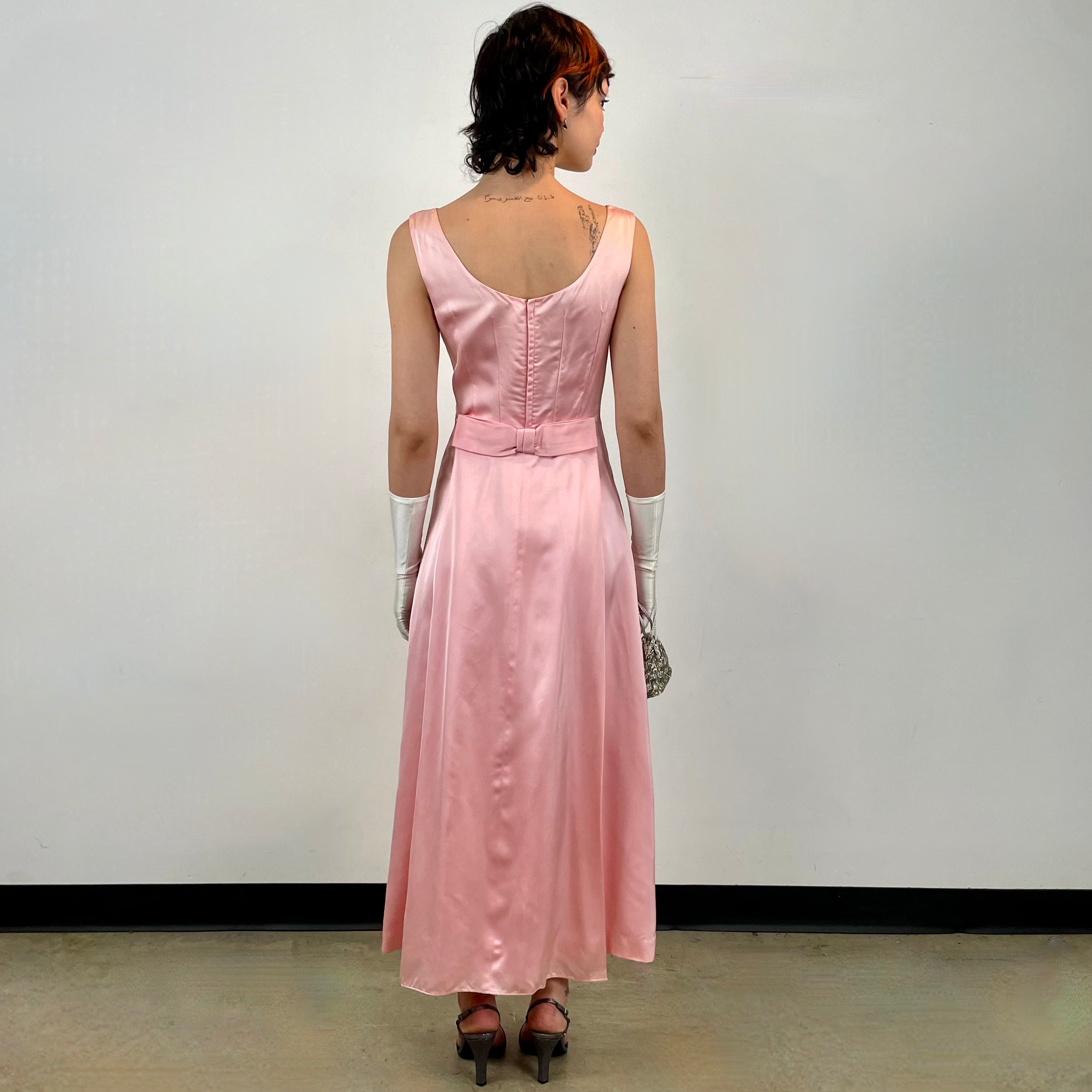 Back view 1960s Pink Satin Gown with Beading
Size Small
Sold at bohemevintage.com Montréal