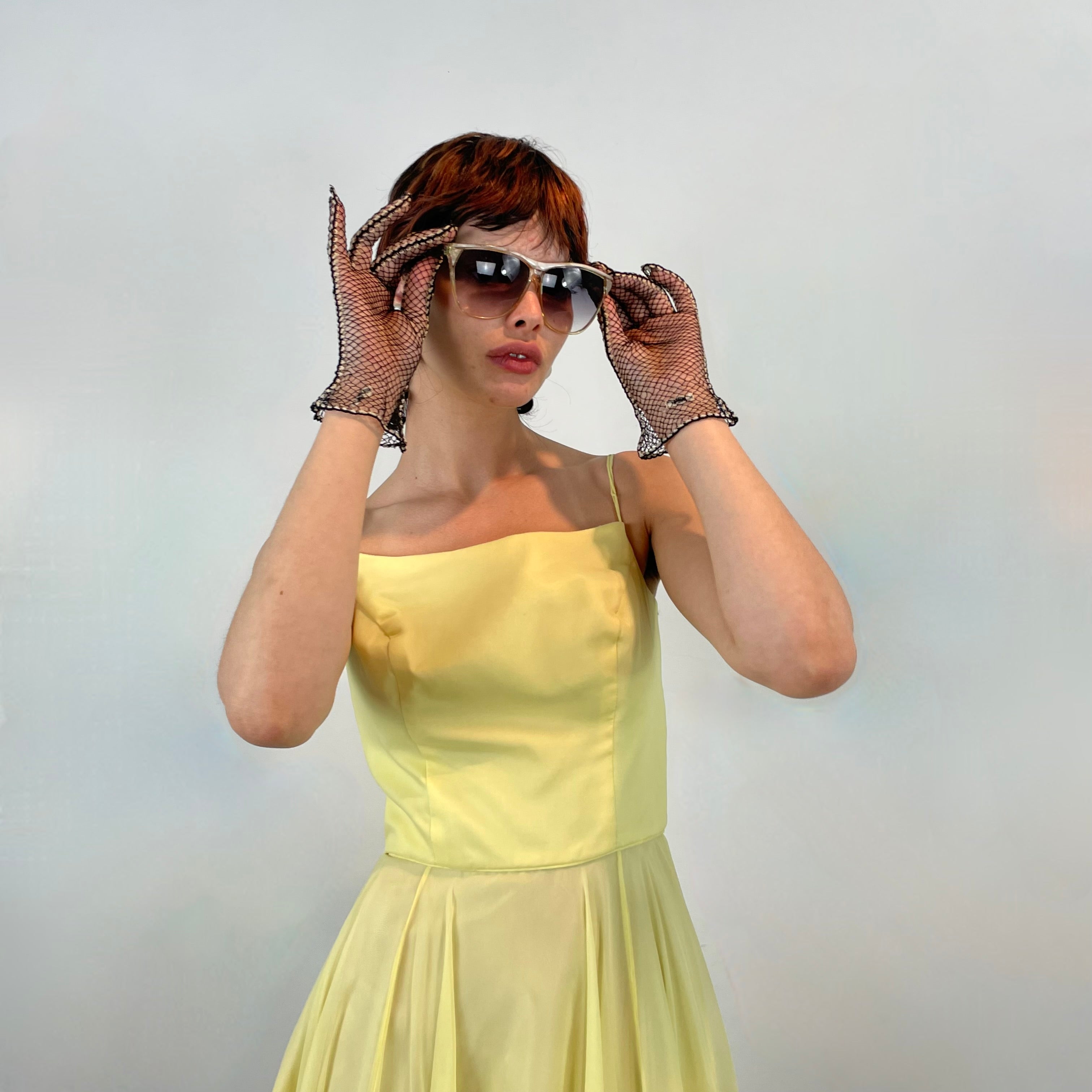 Close-up view of 1960s Yellow Chiffon Cocktail Dress
size Small
sold at bohemevintage.com
Montréal