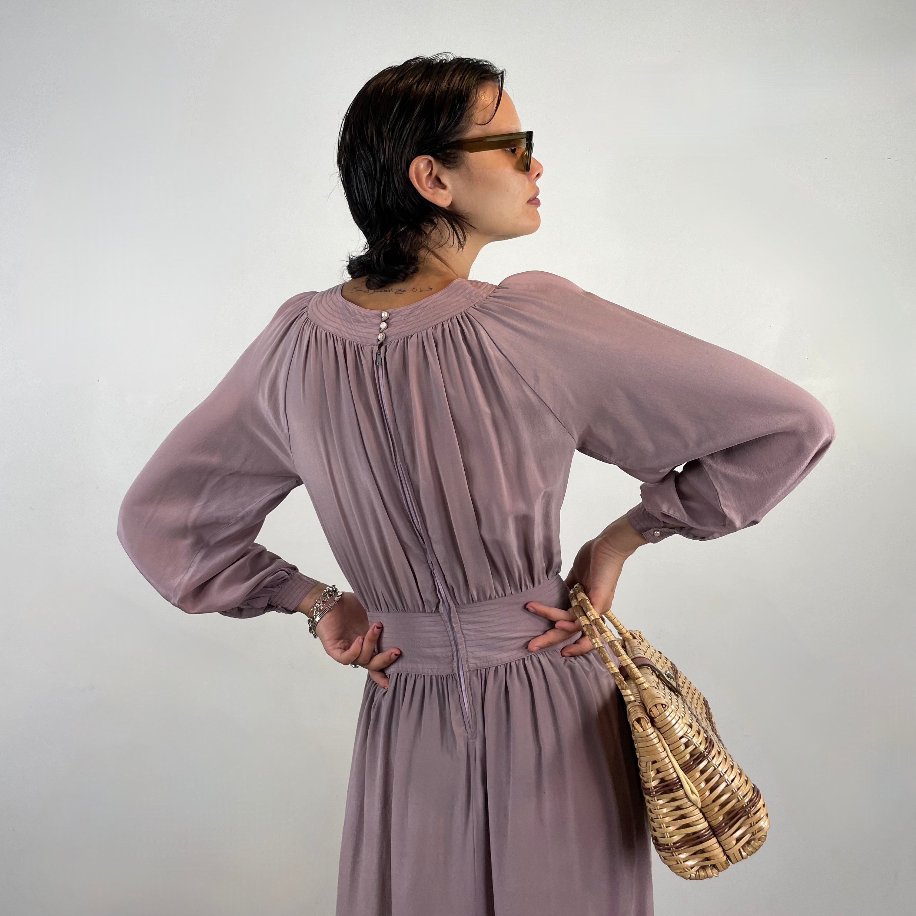 Close up back view 1970s Long Sleeved Silk Midi Dress
Size small
Sold at bohemevintage.com
Montréal