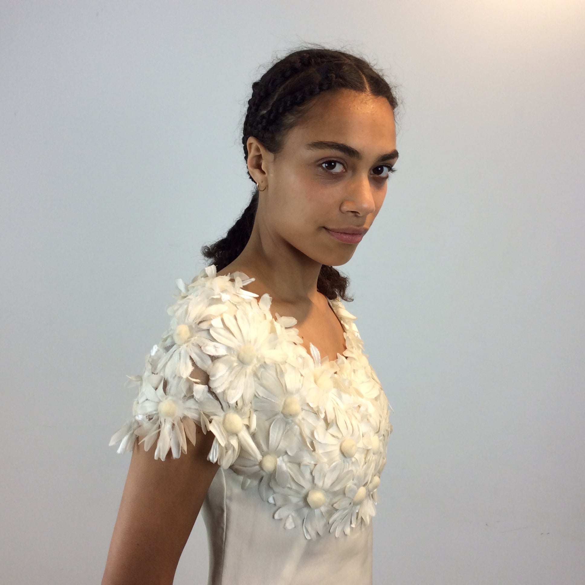 Close up side view of 1970s Daisy Embellished Ivory Organza Maxi Dress
Size Small
Sold at bohemevintage.com
Montréal