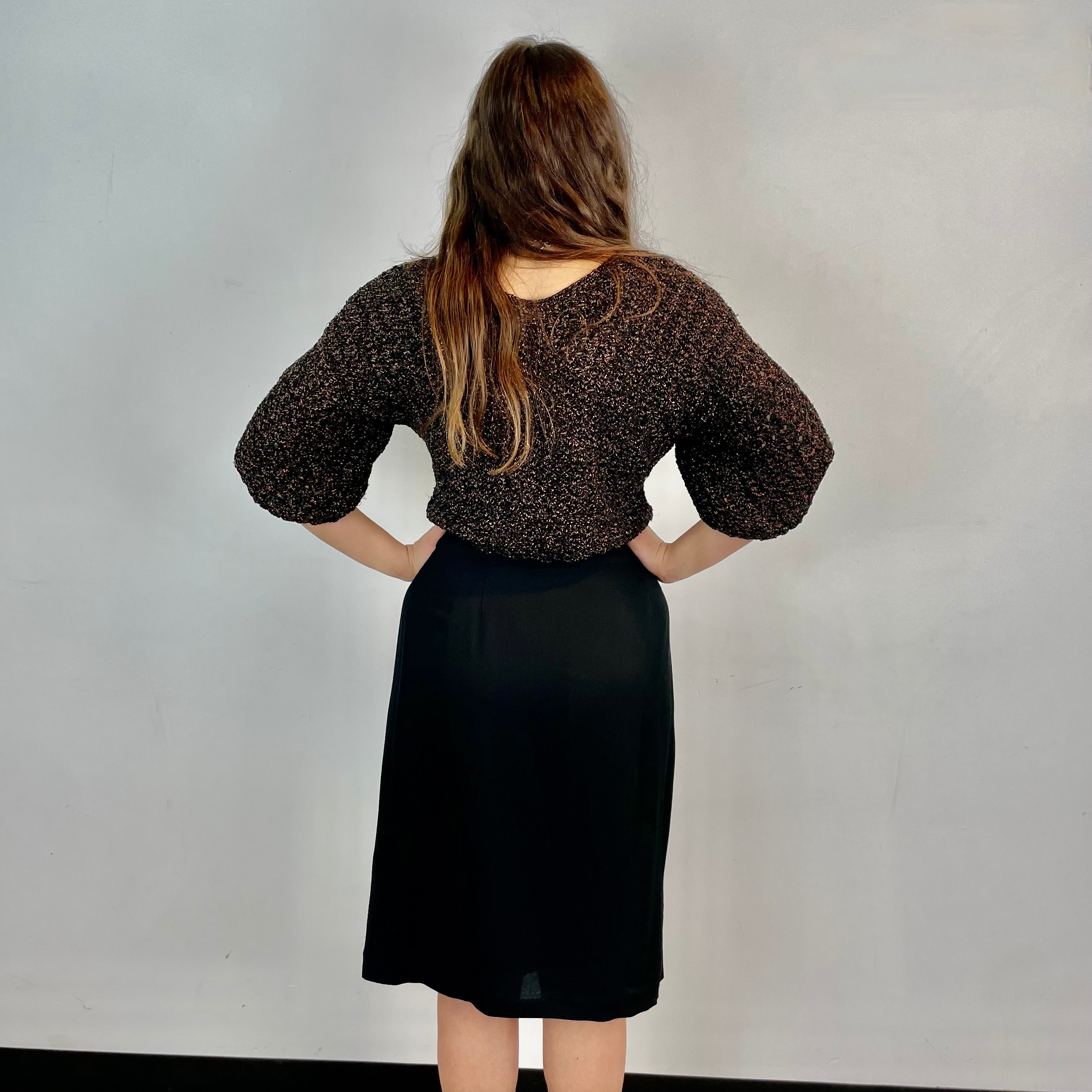 Back view of Emporio Armani Designer Black Wrap Skirt Size Medium sold at bohemevintage.com Montreal