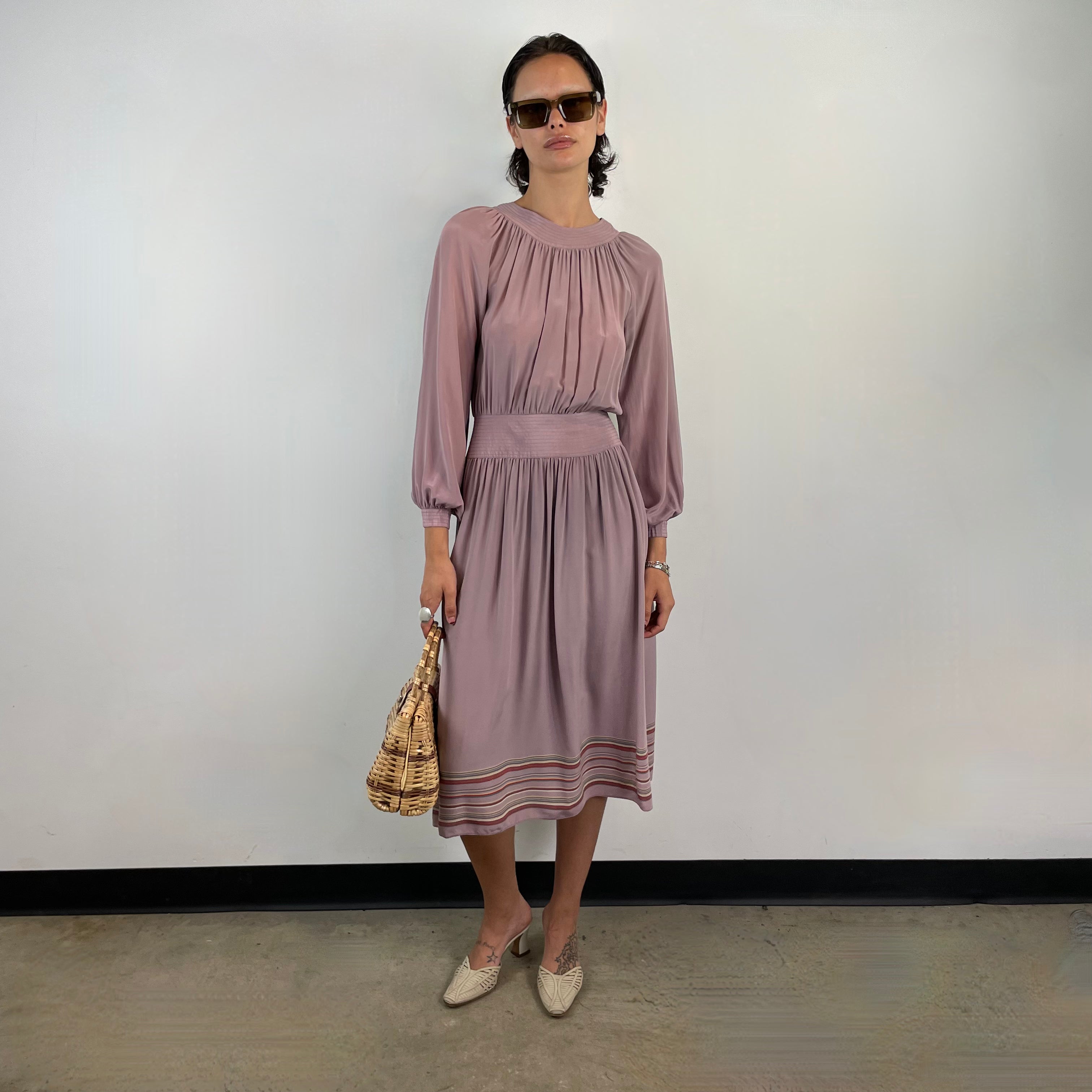 Front view 1970s Long Sleeved Silk Midi Dress
Size small
Sold at bohemevintage.com
Montréal