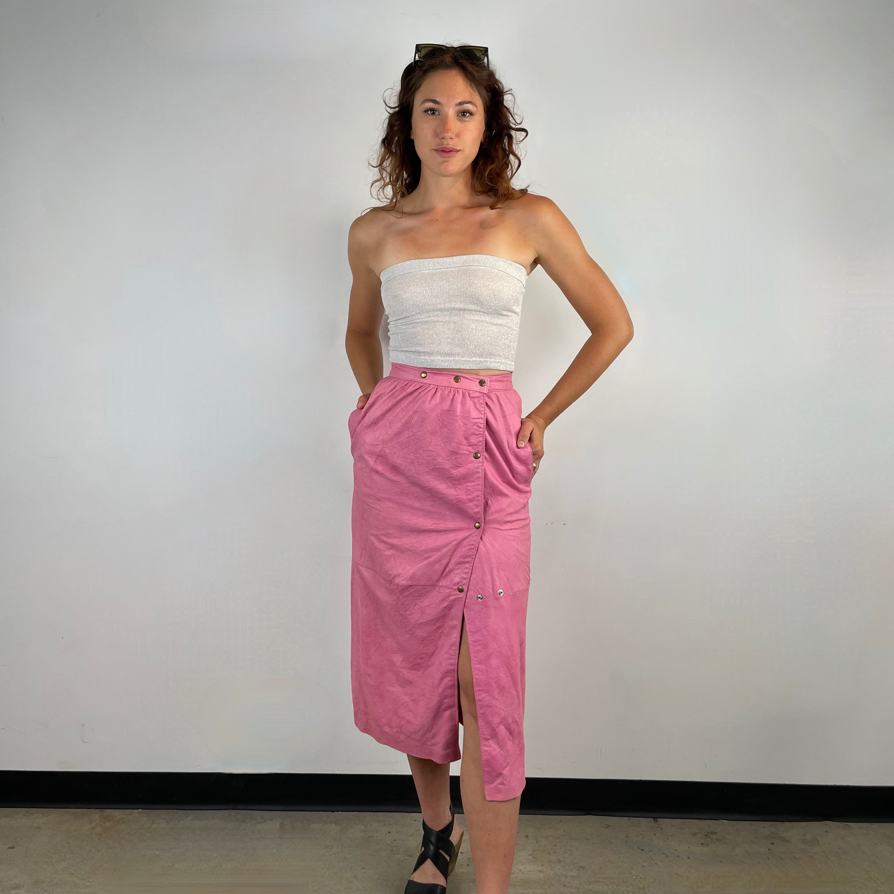 Front view of 1980s Robert Krief Designer Pink Leather Midi Skirt
Size Small/Medium
Sold at bohemevintage.com
Montréal