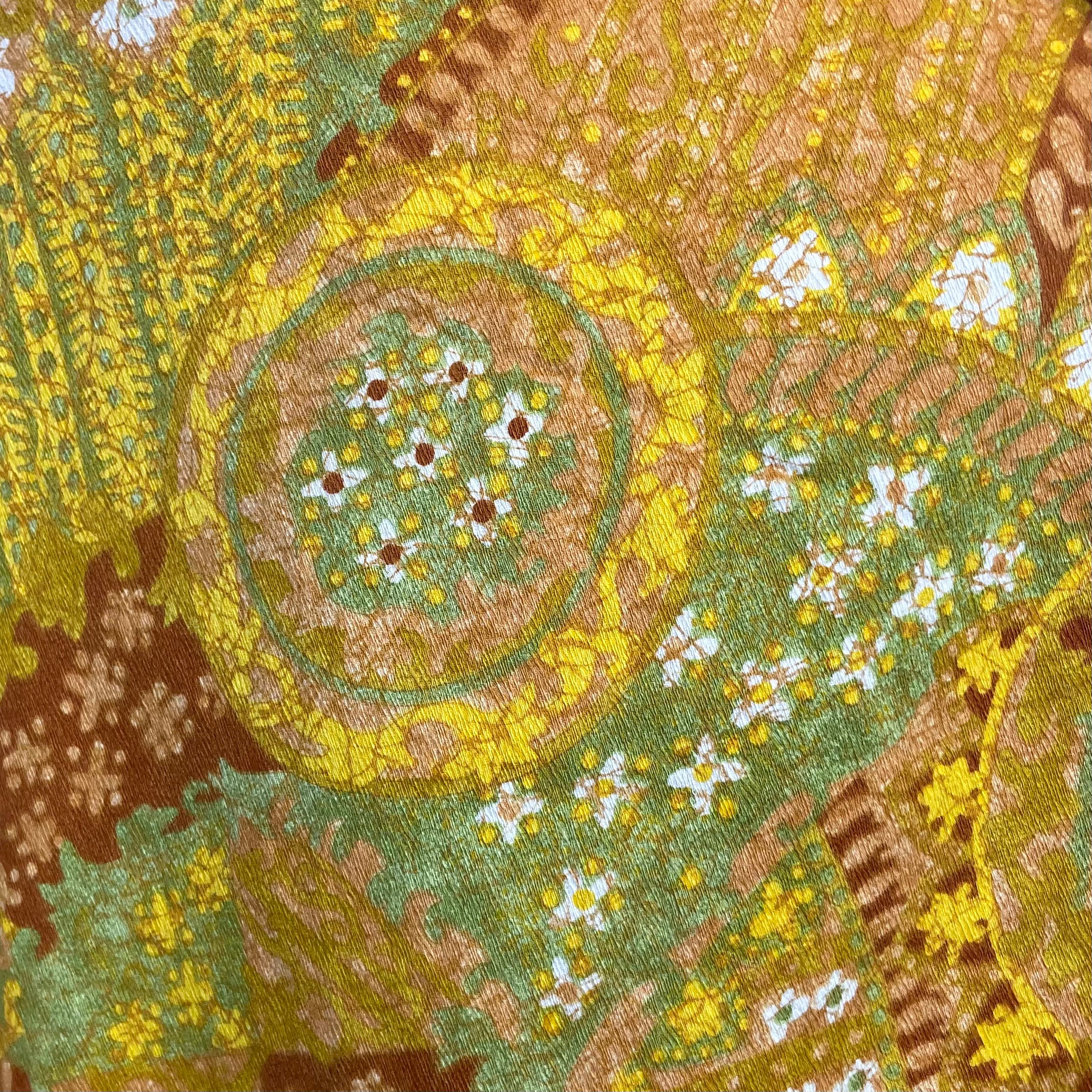 Close up view of fabric of 1970s Bold Print Cropped Jumpsuit
One Size
Sold at bohemevintage.com, Montréal