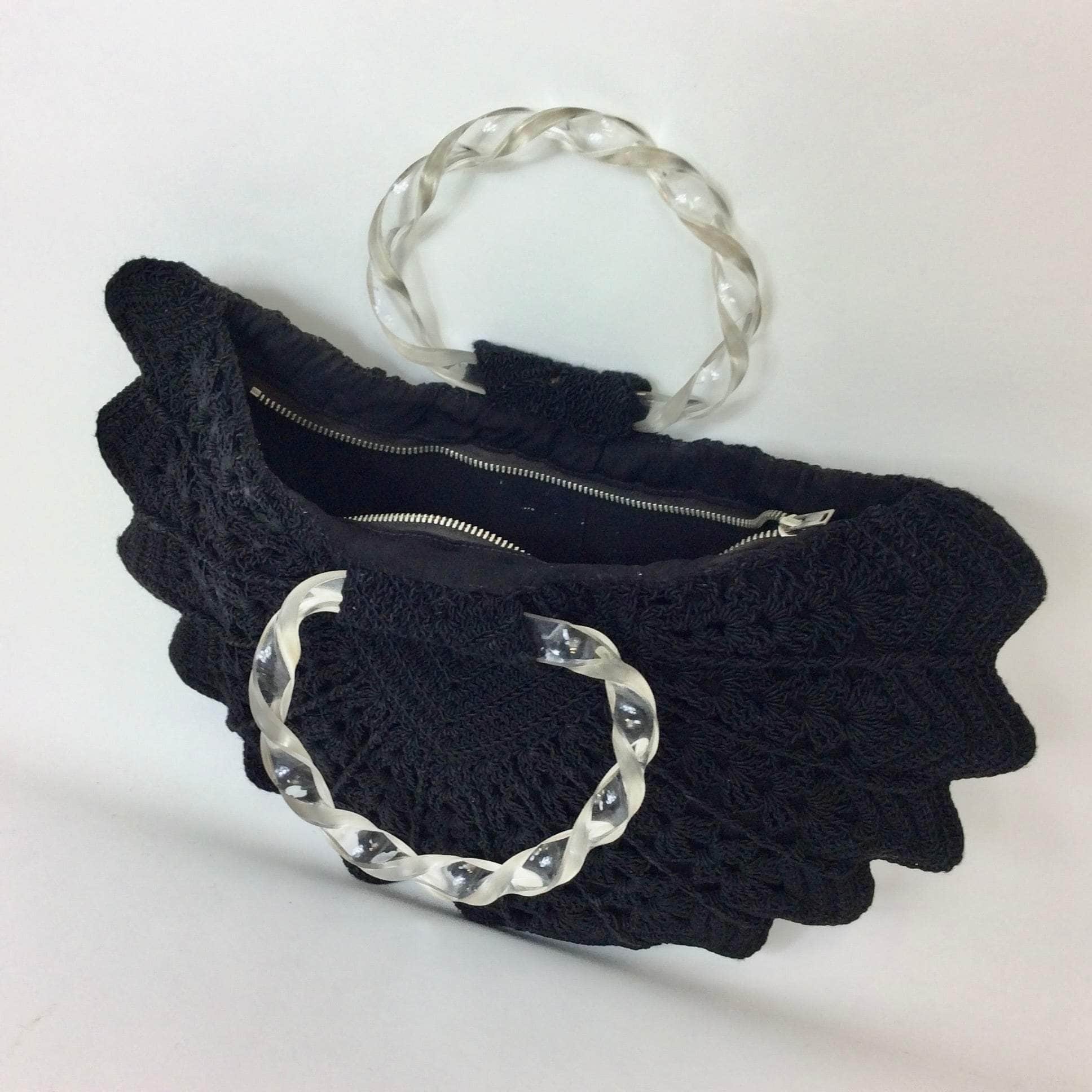 Boheme Vintage 1940s black crochet peacock‑shape evening handbag with clear twisted lucite handles and zipper closure.