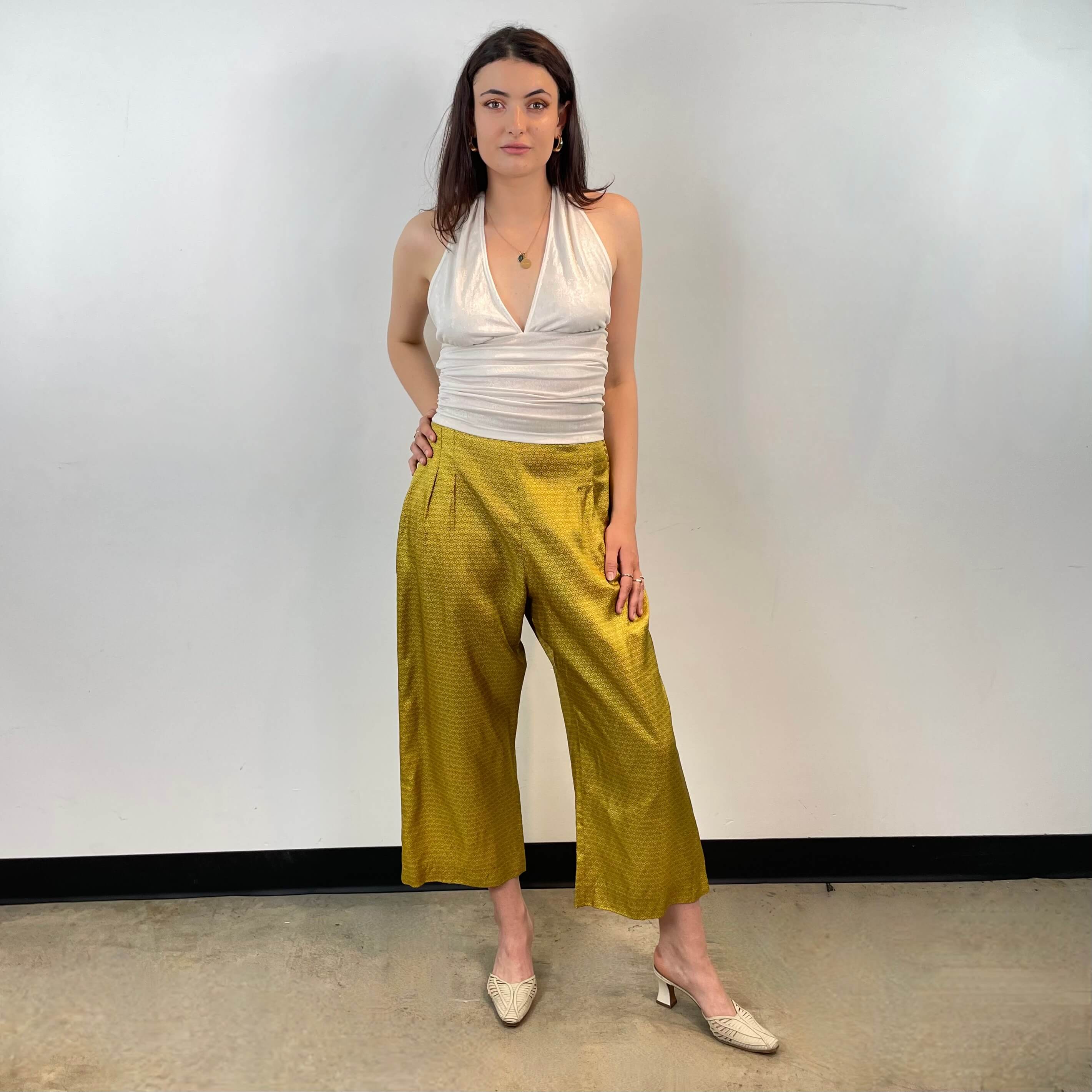 Front view of pants from 1950s Gold Satin Robe and Pants Loungewear Set Size Small/Medium sold at bohemevintage.com Montreal