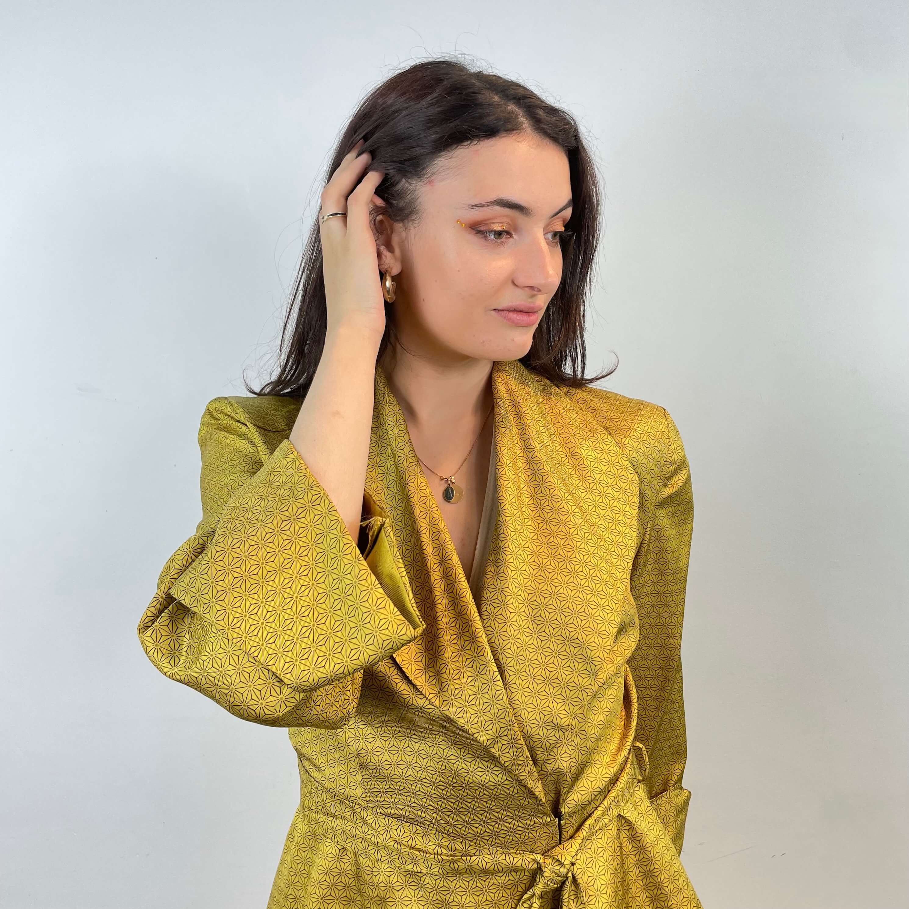 Close-up view of robe from 1950s Gold Satin Robe and Pants Loungewear Set Size Small/Medium sold at bohemevintage.com Montreal