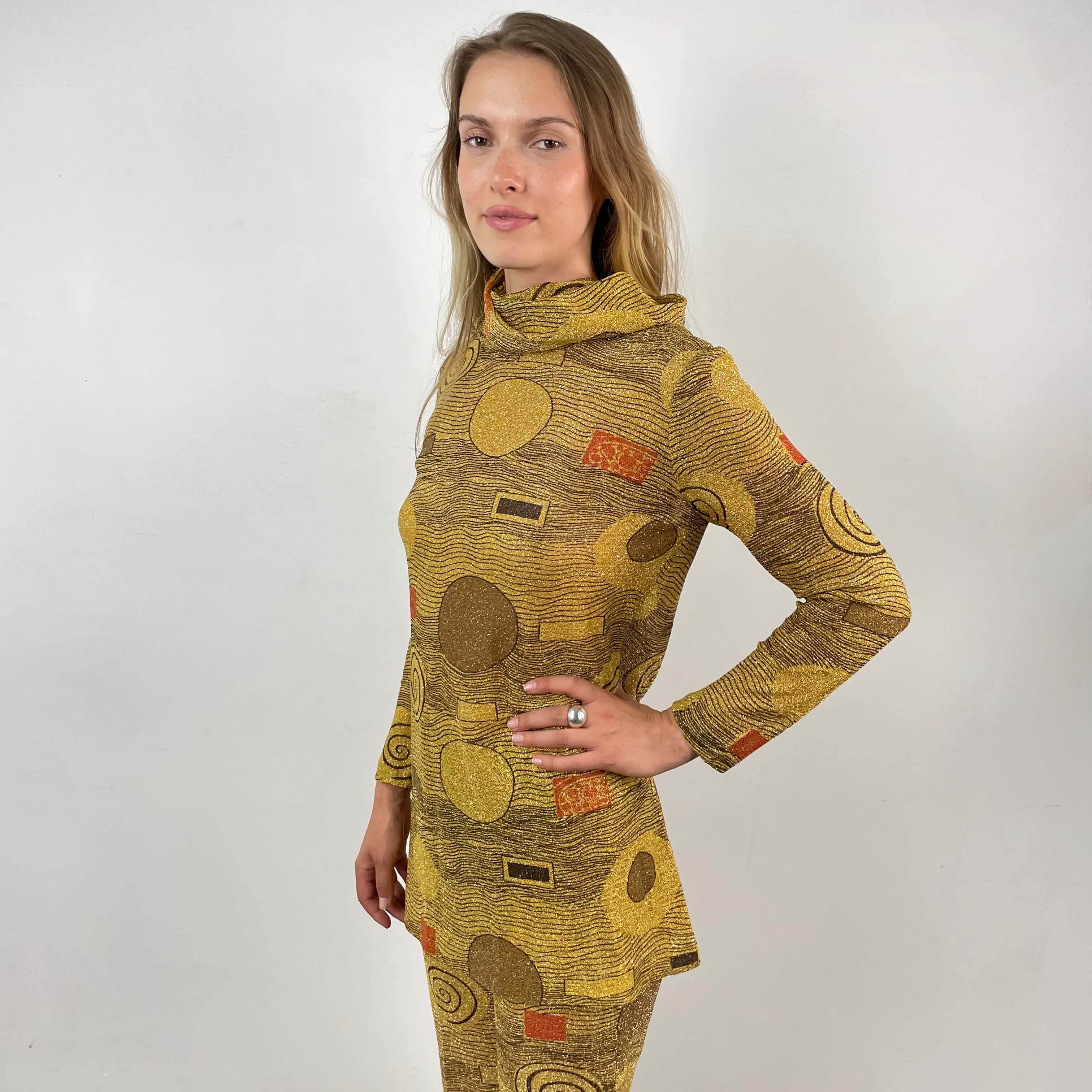 Close-up view of 1960s/70s Gold Patterned Mini Dress and Pant Set Size small sold at bohemevintage.com Montreal