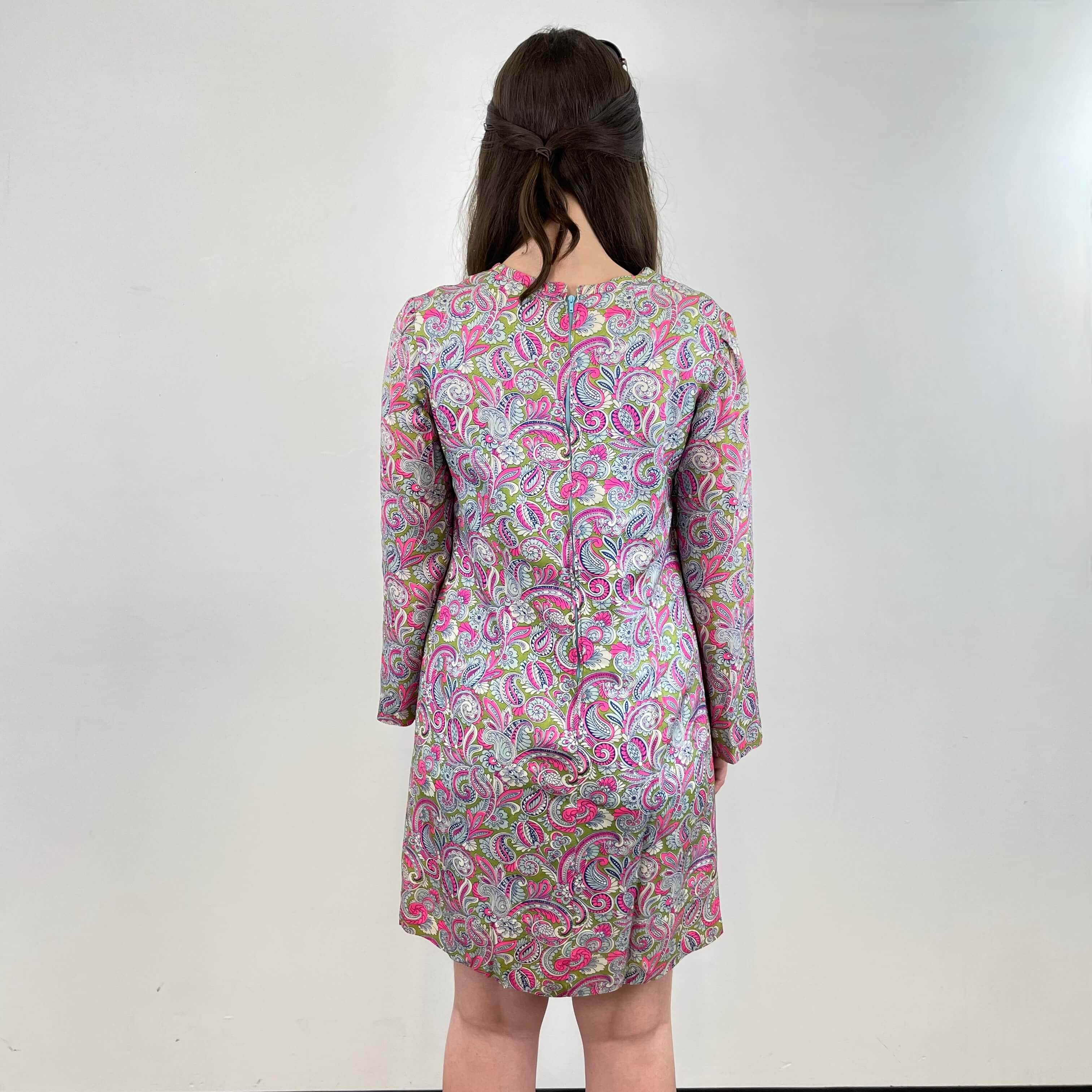 Back view of 1960s Paisley Mini Shift Dress size Medium sold at bohemevintage.com Montreal
