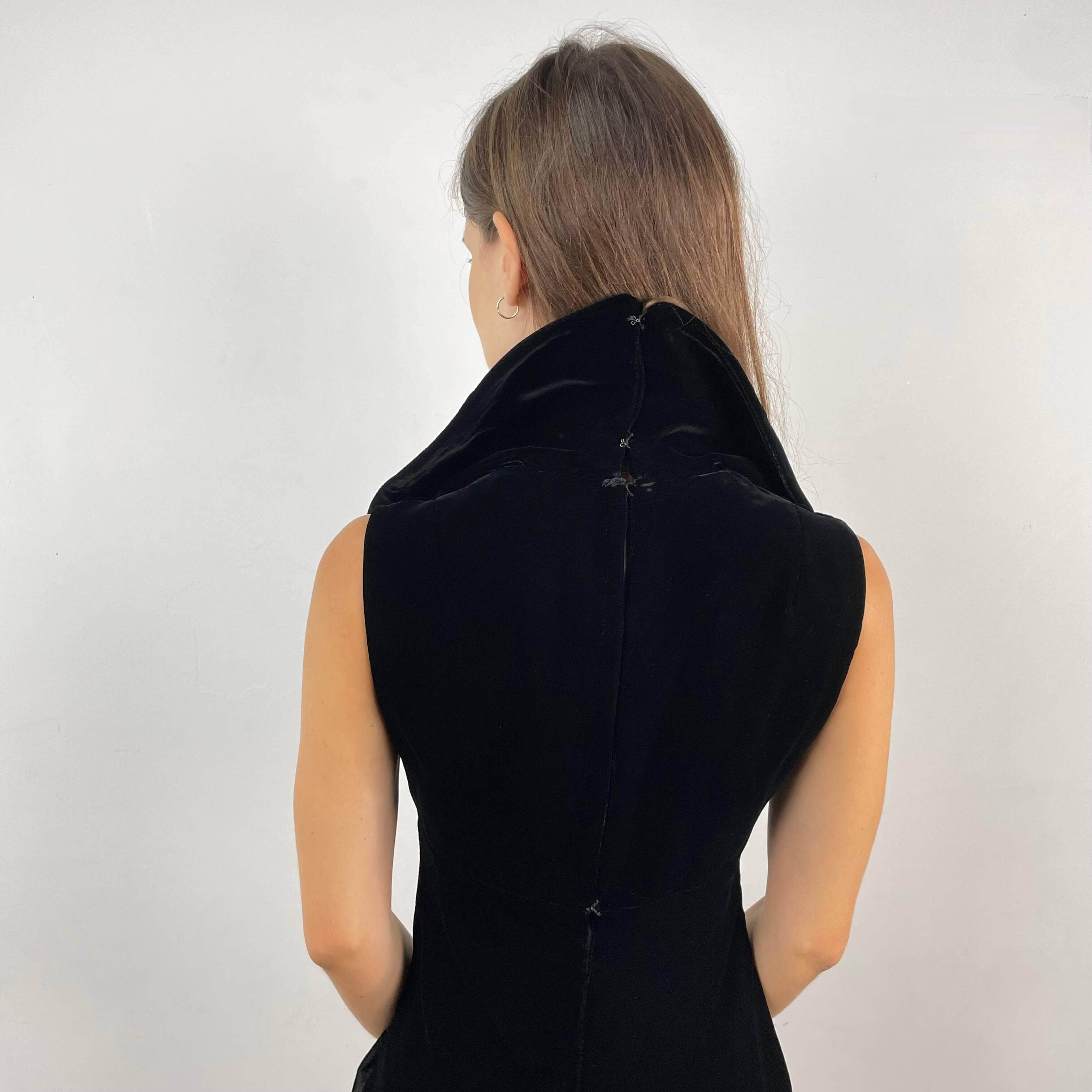 Back view of 1970s Deep V-Neck Black Velvet Midi Dress Size Small sold on bohemevintage.com Montreal