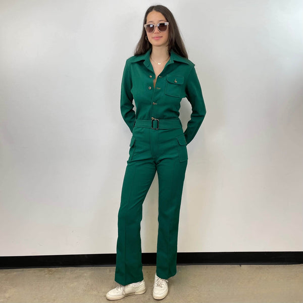 Front view of 1970s Long Sleeve Green Jumpsuit Size Medium sold on bohemevintage.com Montreal