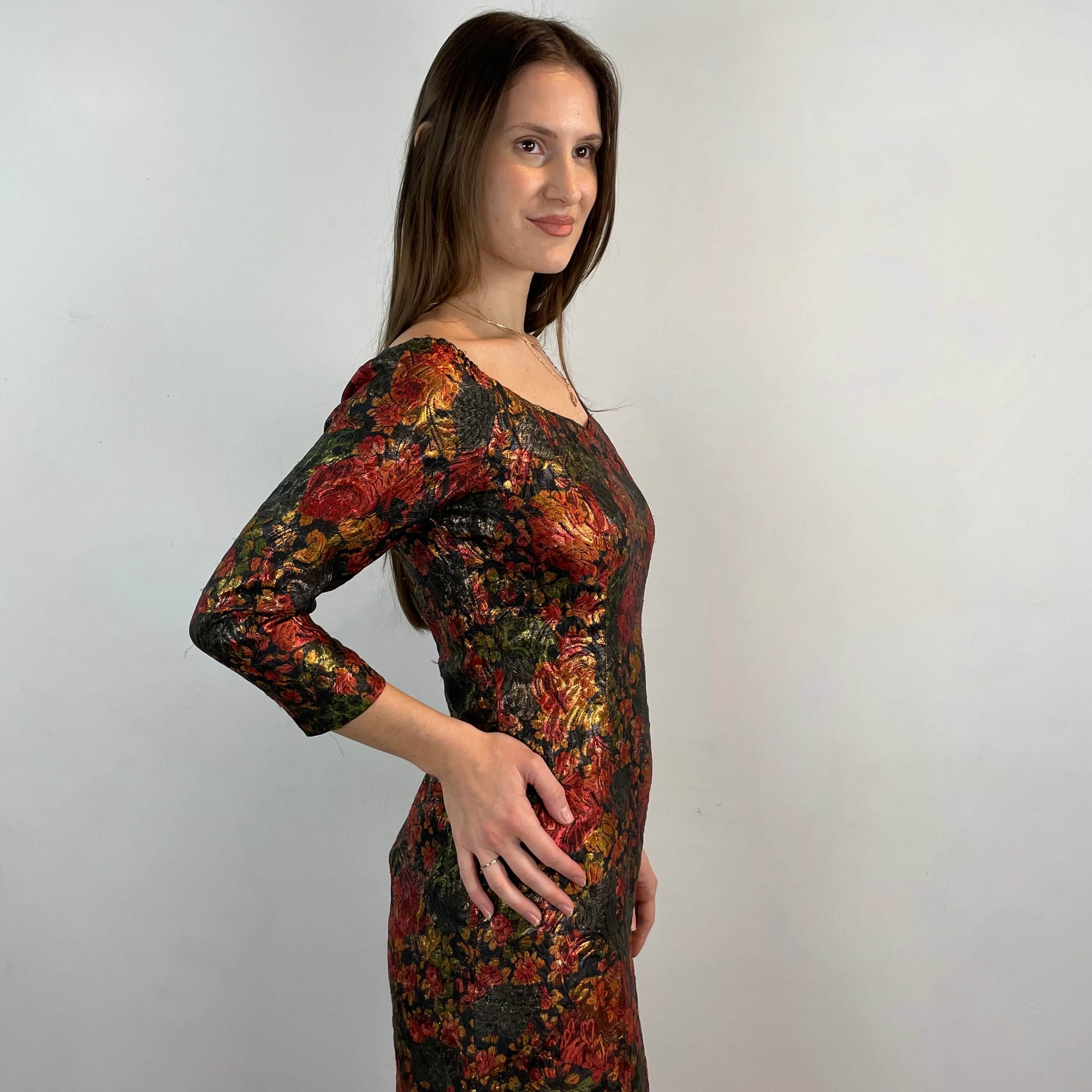 Side View of 1970s Off-the-Shoulder Metallic Brocade Vintage Prom dress Size Small/Medium sold at bohemevintage.com Montreal