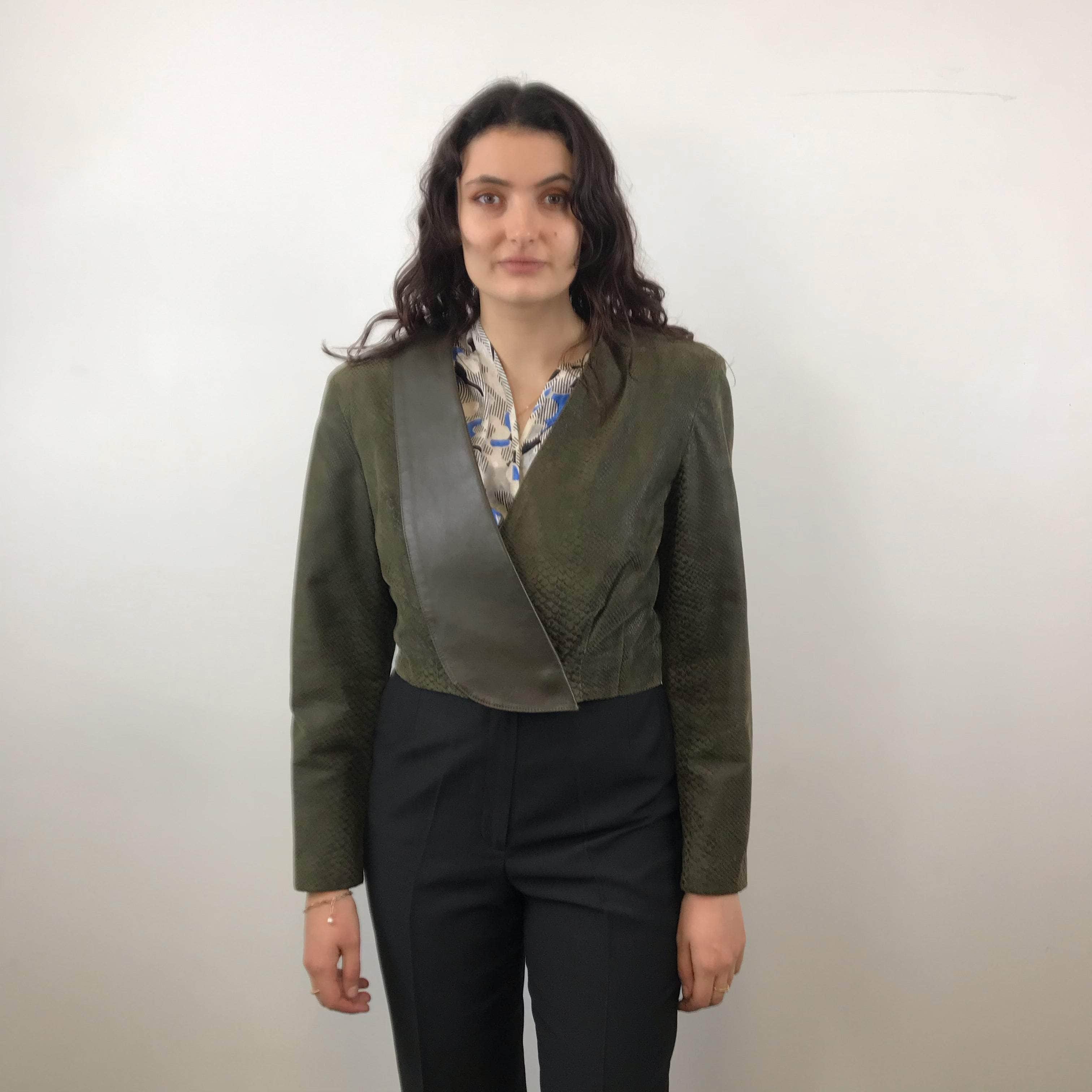 Front view of 1980s Danier Cropped Leather Jacket size Medium sold at bohemevintage.com Montreal