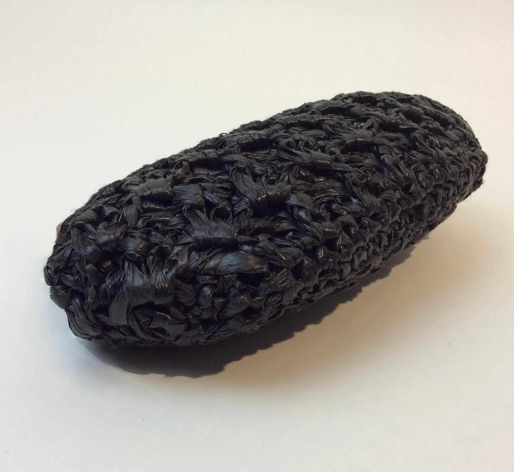 1960s Small Black Crocheted Raffia Evening Clutch sold at bohemevintage.com Montreal