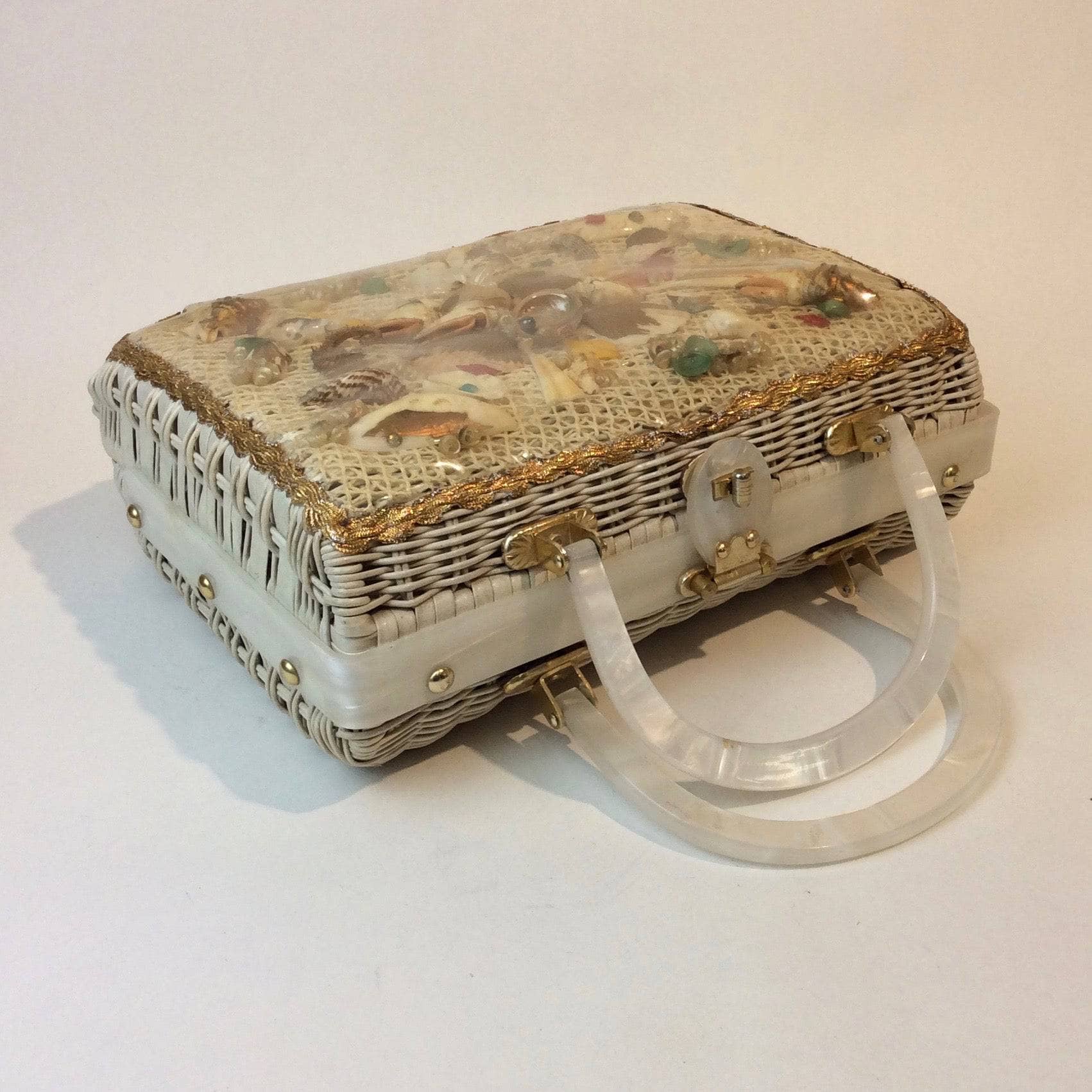 1950s-60s Seashell White Wicker Basket Purse sold by bohemevintage.com Montreal