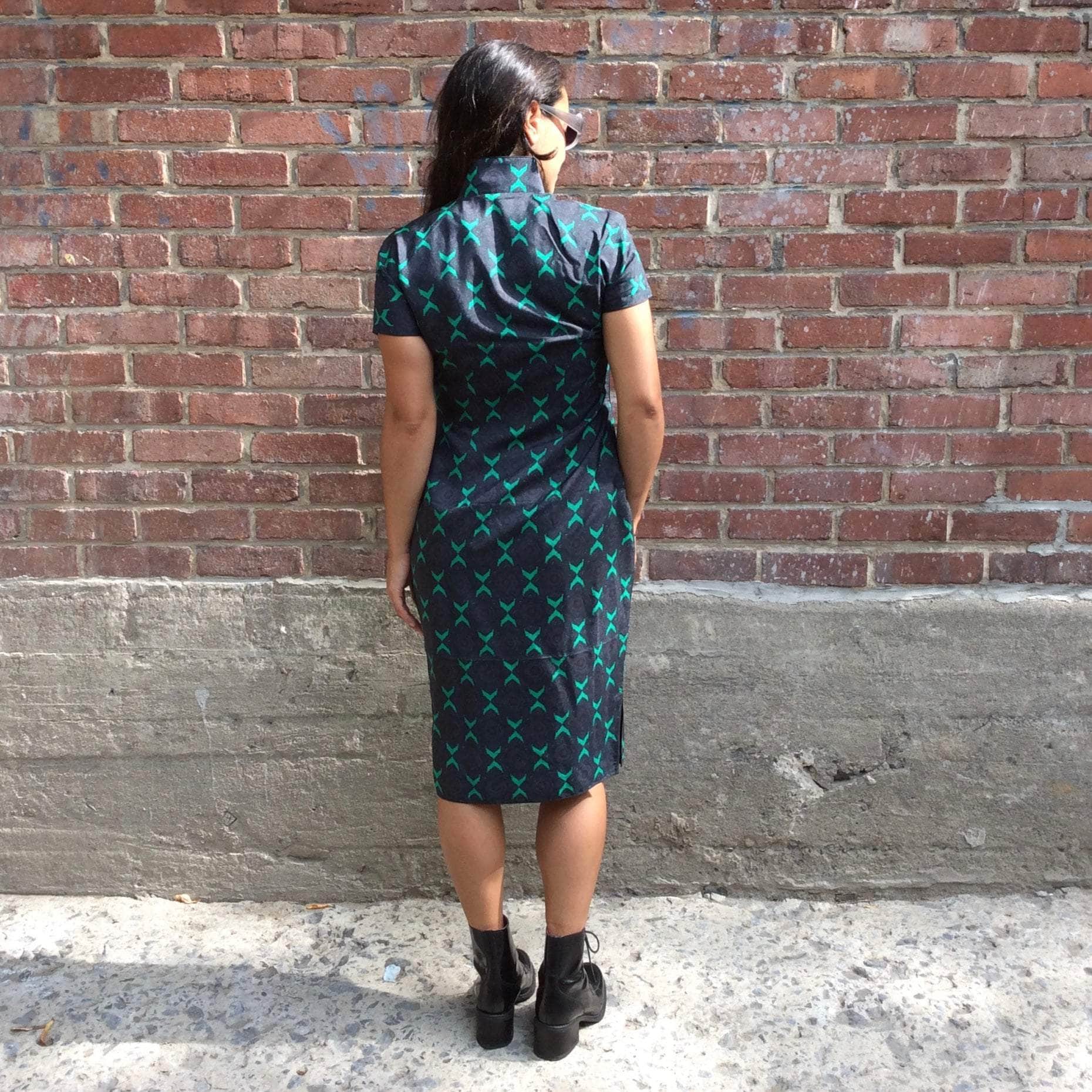 Back view of 1960s short sleeve blue cheongsam silk dress small-medium sold at bohemevintage.com Montreal