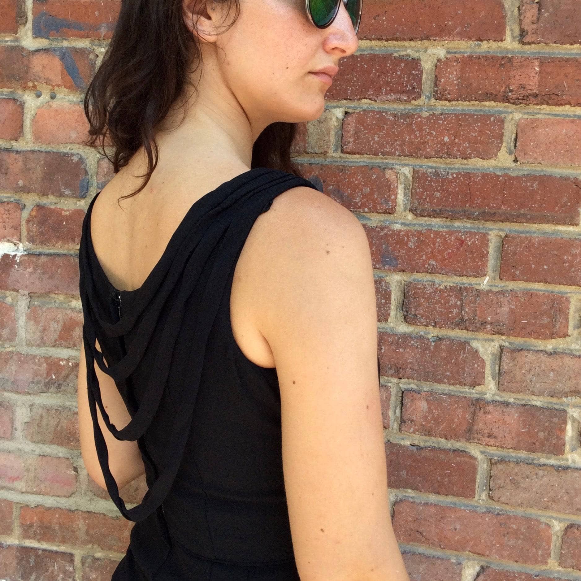 Shoulder view of 1950s Black Open-Back Cocktail Dress Size Small, Sold by bohemevintage.com Montréal