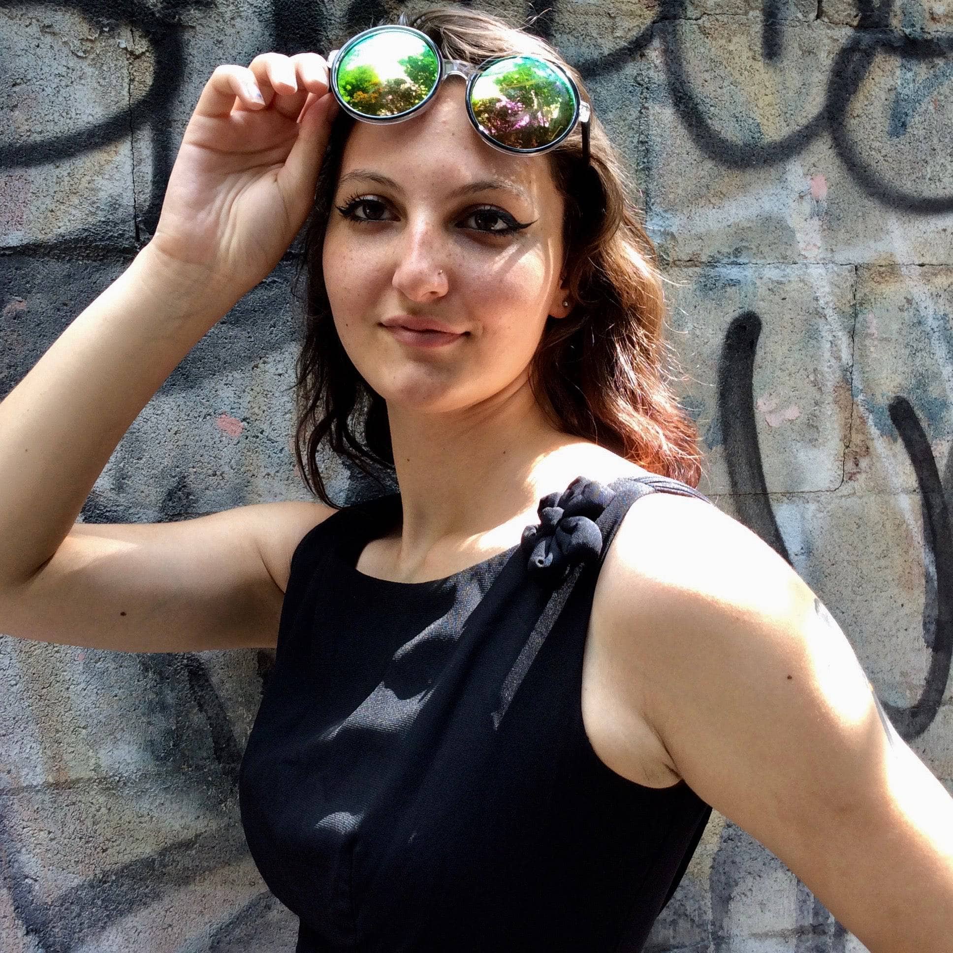 Front shoulder view of 1950s Black Open-Back Cocktail Dress Size Small, Sold by bohemevintage.com Montréal