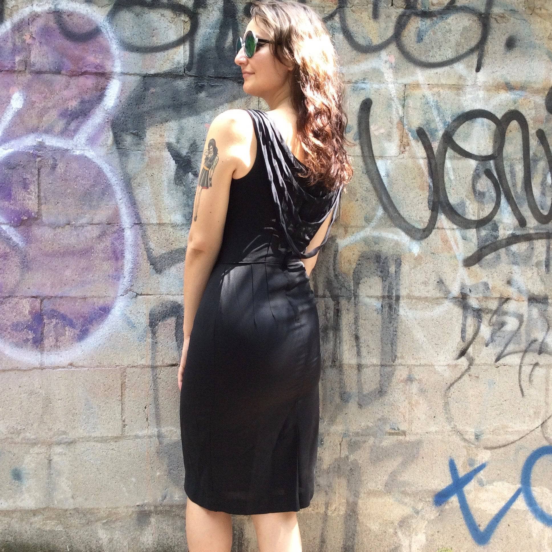 Back View of 1950s Black Open-Back Cocktail Dress Size Small, Sold by bohemevintage.com Montréal