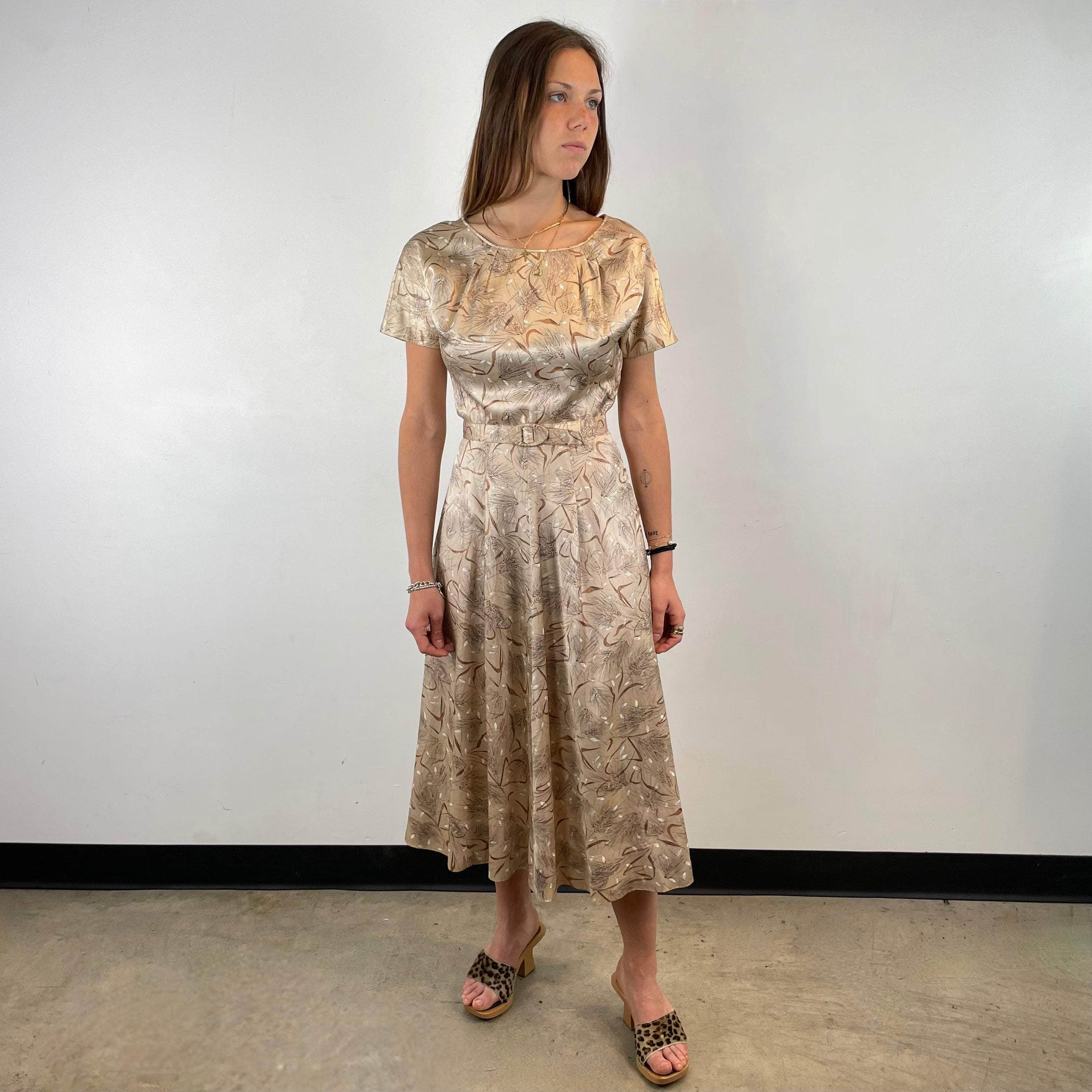 1950s Short-Sleeve Satin Flared Midi Dress Size X-Small / Small sold at bohemevintage.com Montreal