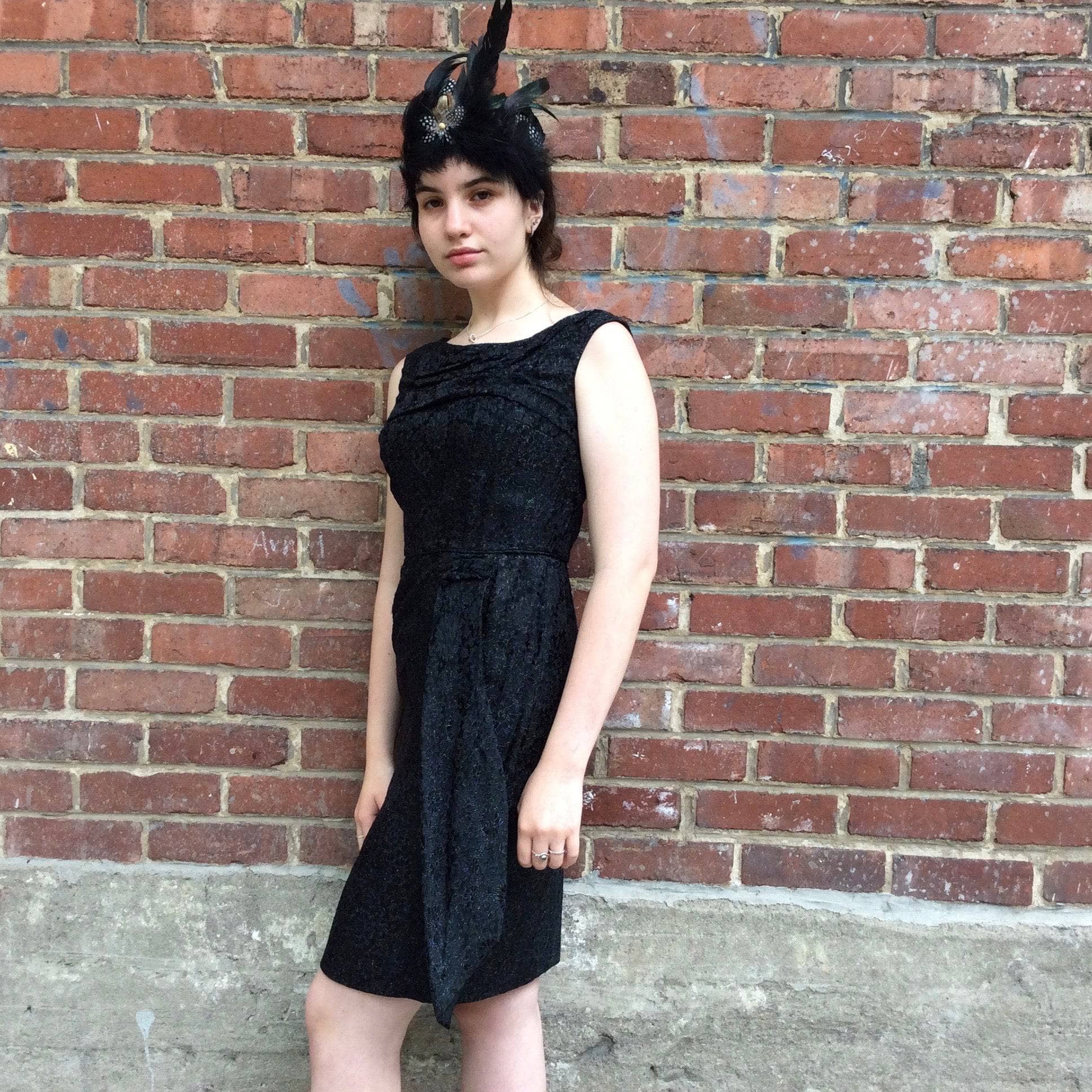 Side View of 1950s Sleeveless Knee-length Black Brocade Dess Size Small sold by bohemevintage.com Montreal