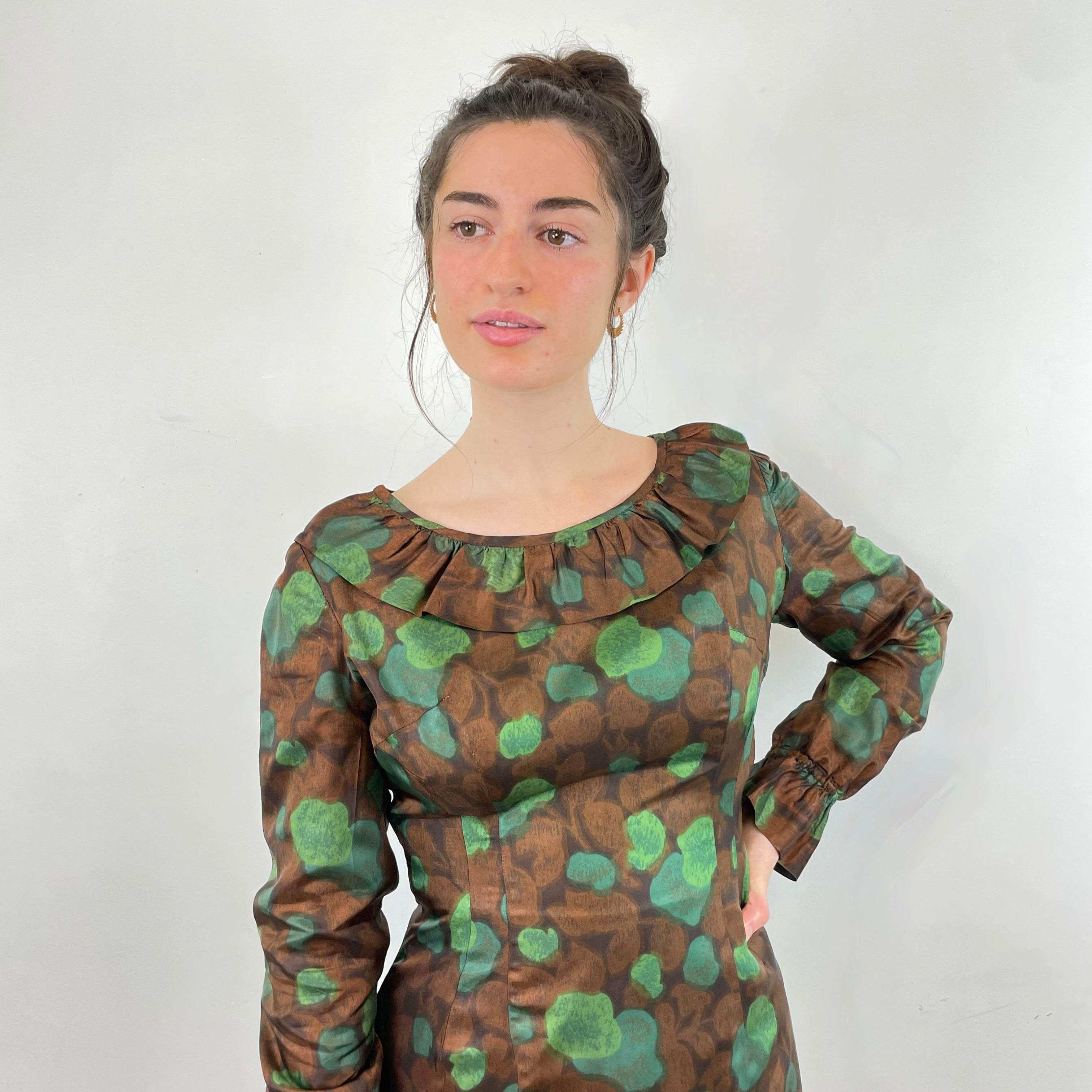 Close up view of 1960s-70s Long Sleeved Sheath Dress Size Small/Medium sold at bohemevintage.com Montreal