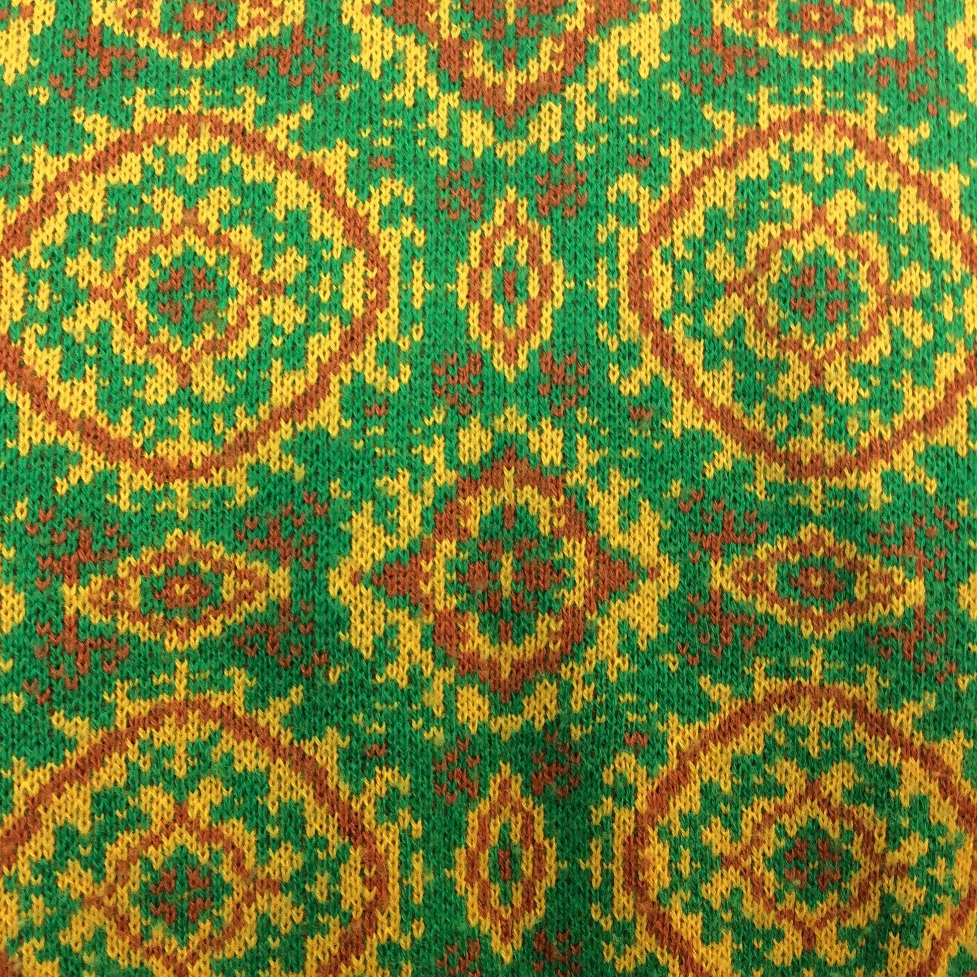 Close-Up of Knit design of 1960s Green and Yellow Knitted Blazer and Cami Set Size Small/Medium. Sold by bohemevintage.com Montréal
