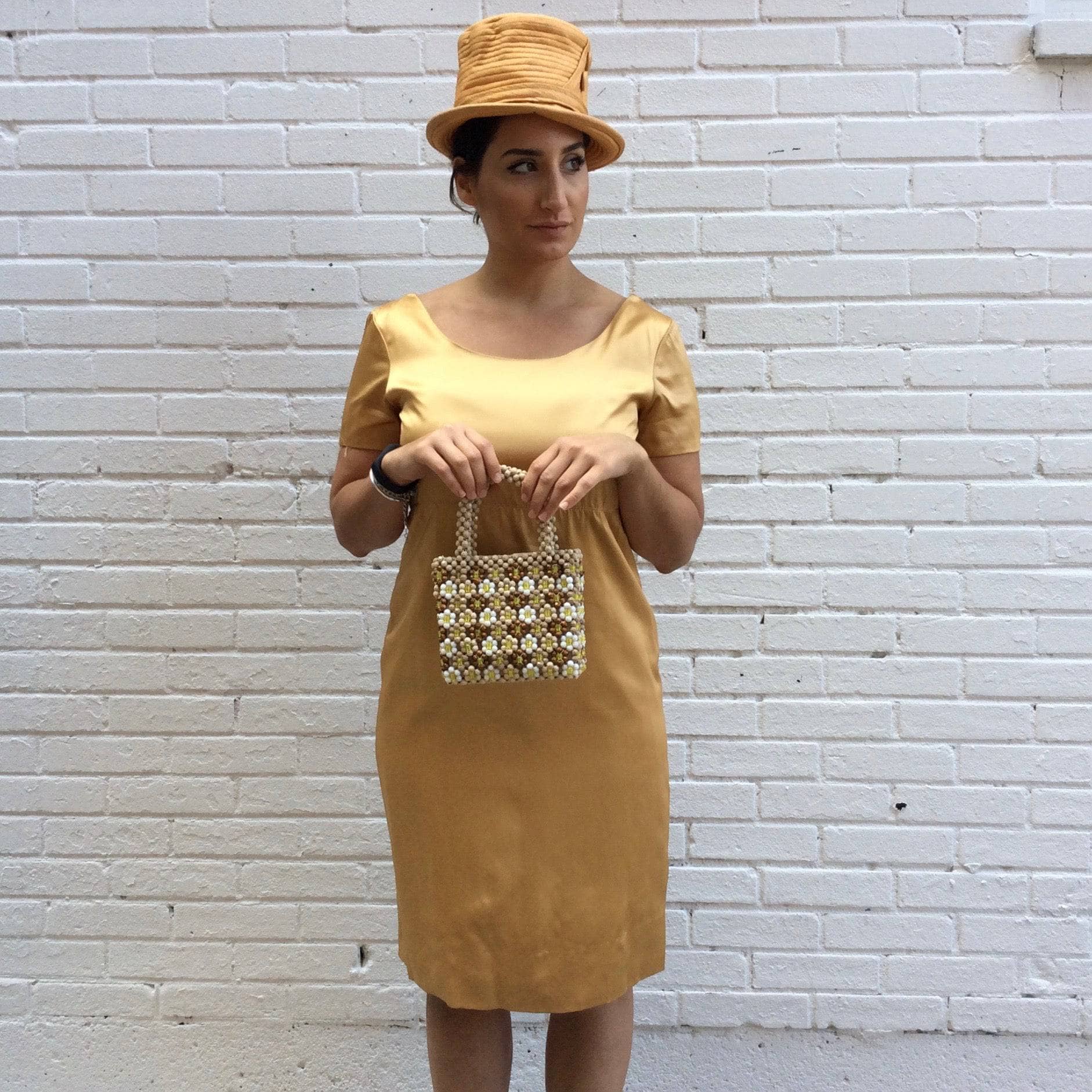 1960s Knee-length Gold Satin Shift Dress. sold by bohemevintage.com Montréal