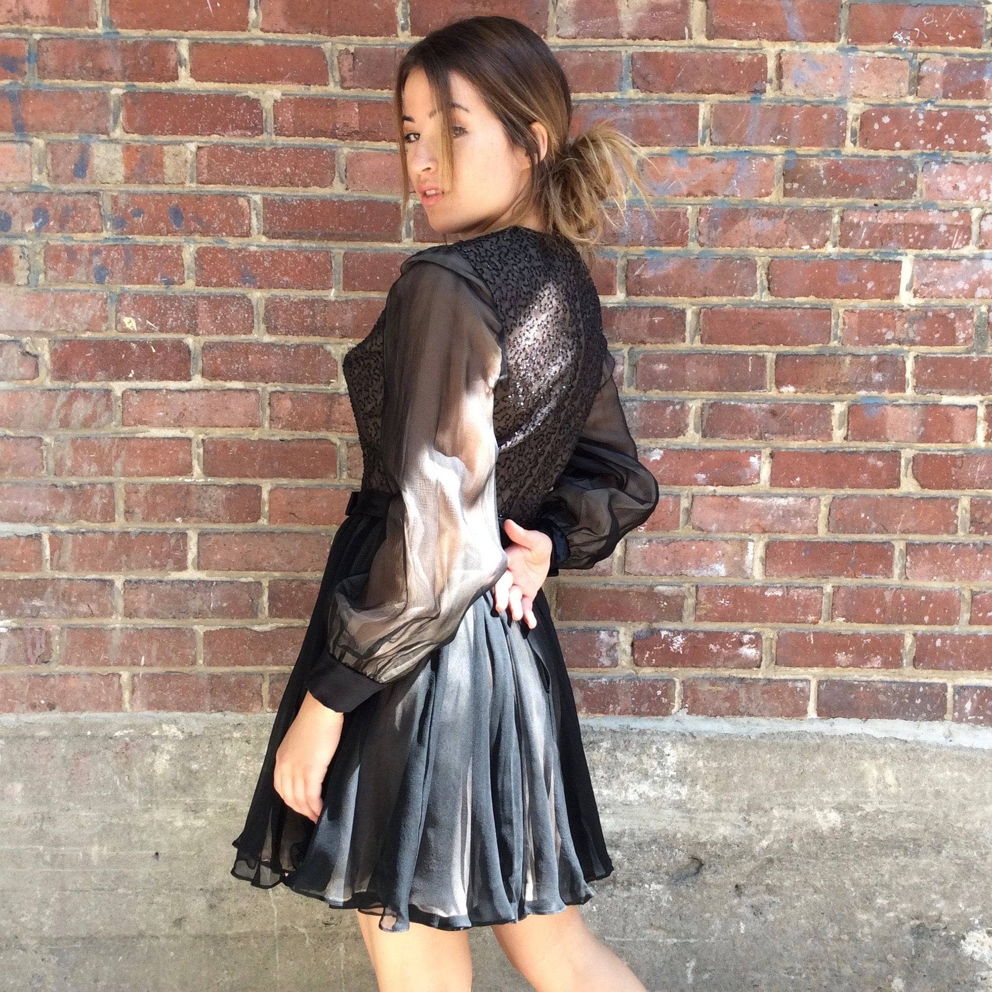 Side view of 1960s "Lily Simon" Sequin and Beaded Silk Chiffon Couture Mini Dress Size Small sold by bohemevintage.com Montréal