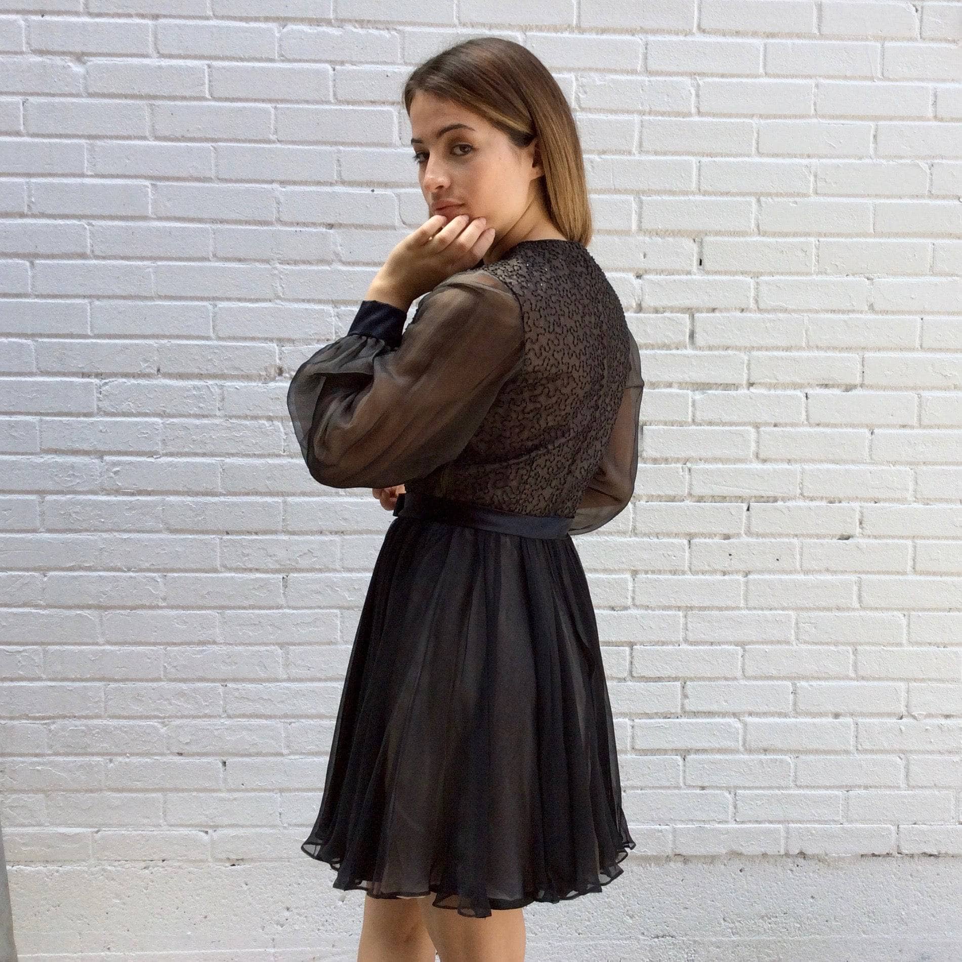 Side view of 1960s "Lily Simon" Sequin and Beaded Silk Chiffon Couture Mini Dress Size Small sold by bohemevintage.com Montréal