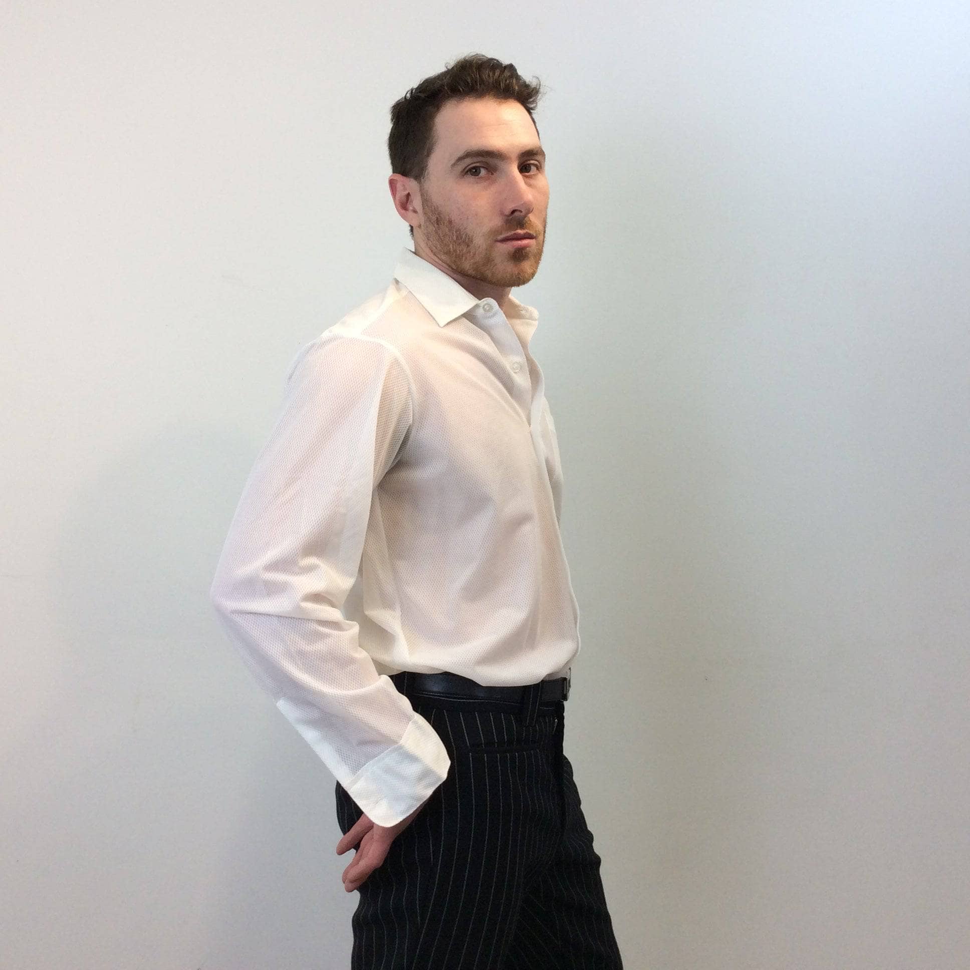 Side view of 1960s Men's White Mesh-Style Dress Shirt. Sold by bohemevintage.com Montreal