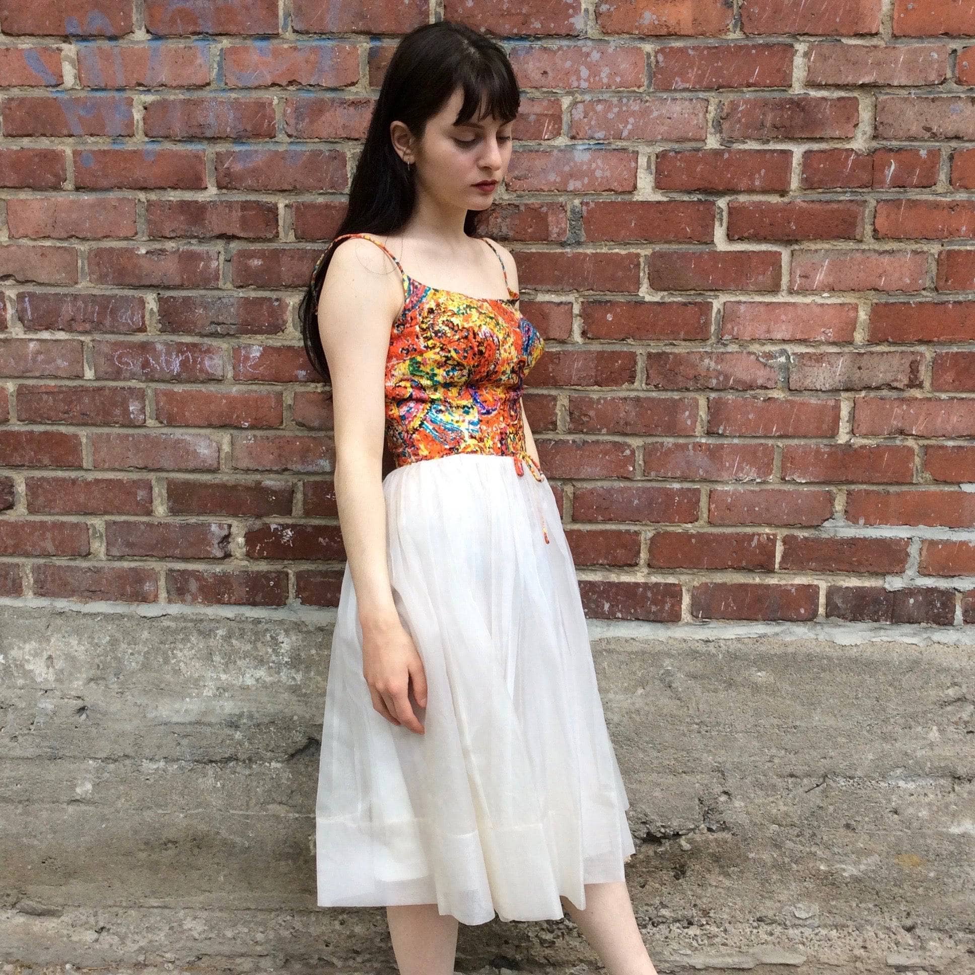 Side View of 1960s Petite Silk Cocktail Dress size extra small/ Small sold by bohemevintage.com Montréal