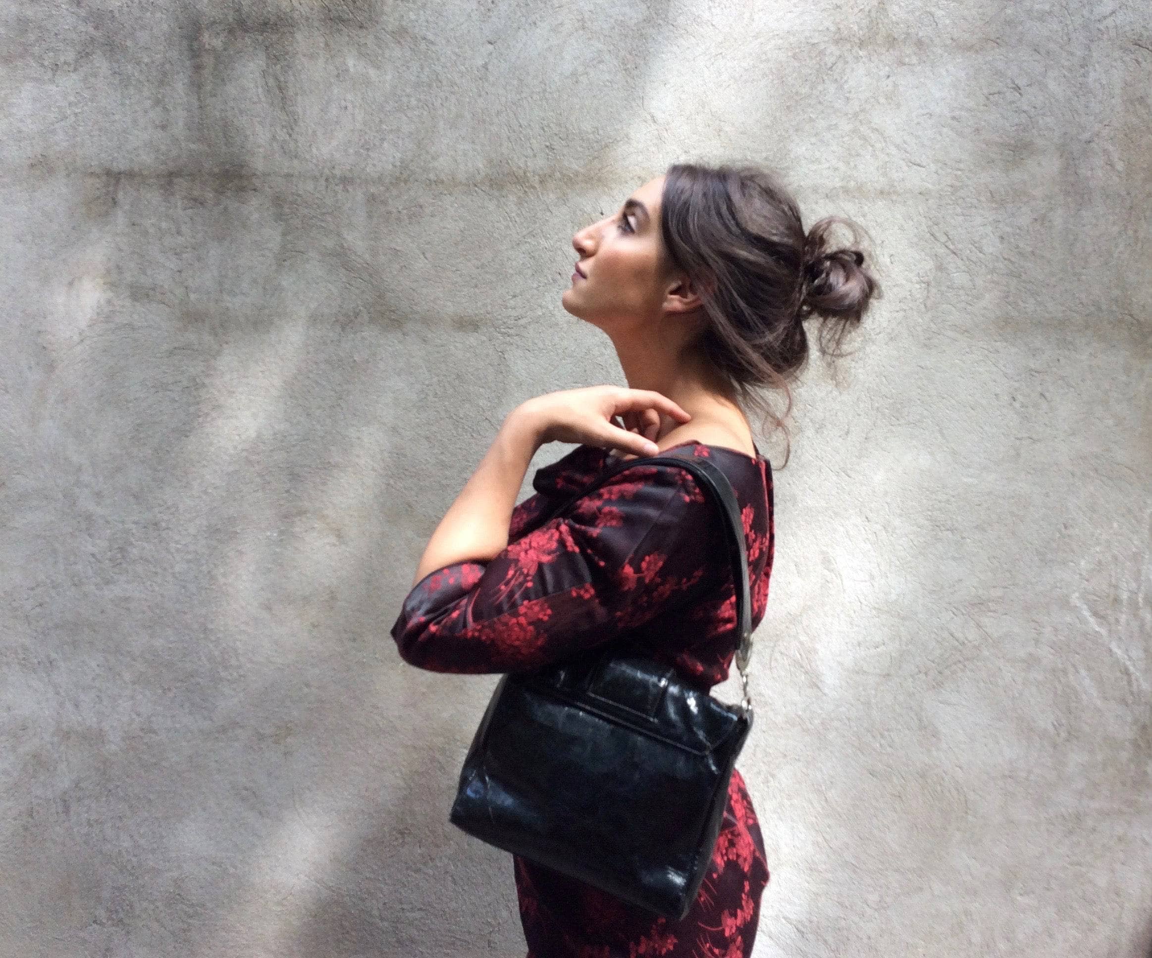 Side view of 1960s Red and Black Floral Satin Brocade Sheath Cocktail Dress. Sold by bohemevintage.com Montreal