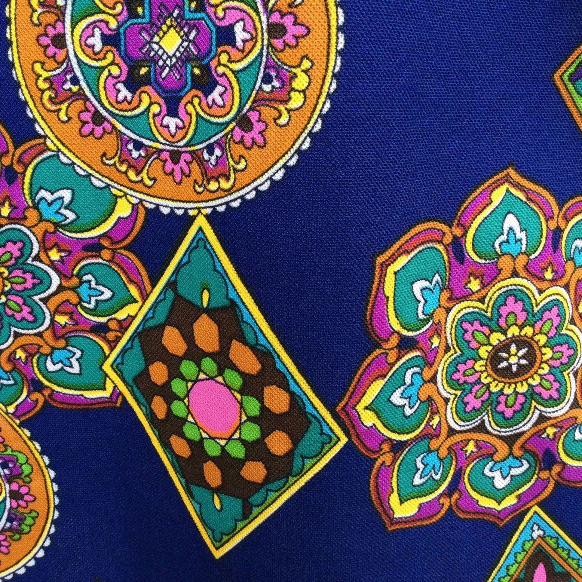 Close-Up of fabric design of 1970s A-Line Mandala Pattern Maxi Skirt Size Small, sold by bohemevintage.com Montréal