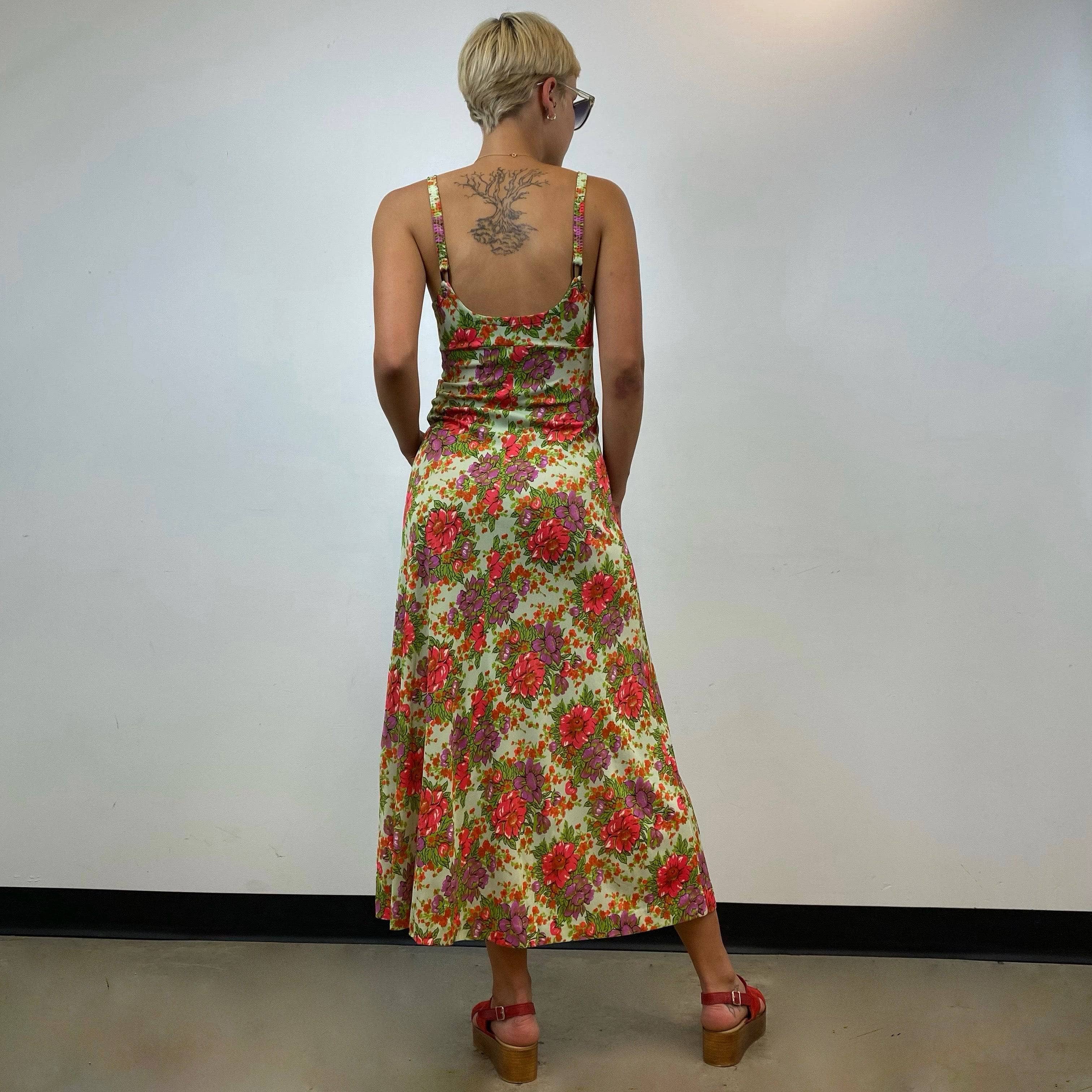 Back view of 1970s Floral Print , Fit and Flare, Bold Floral Print, lightweight synthetic fabric, size small, thin straps, empire waist, Maxi Summer Dress, sold by bohemevintage.com Montréal