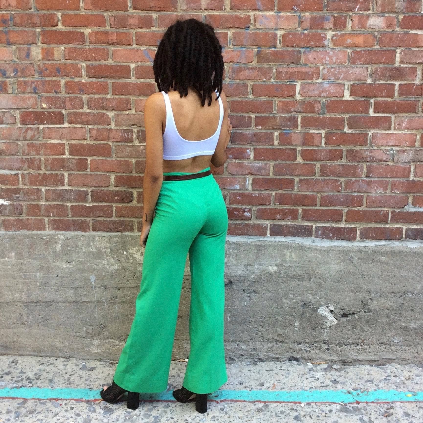 Back view of 1970s Green High Waisted Flared Pants Size Extra Small/Small, Sold by bohemevintage.com Montréal